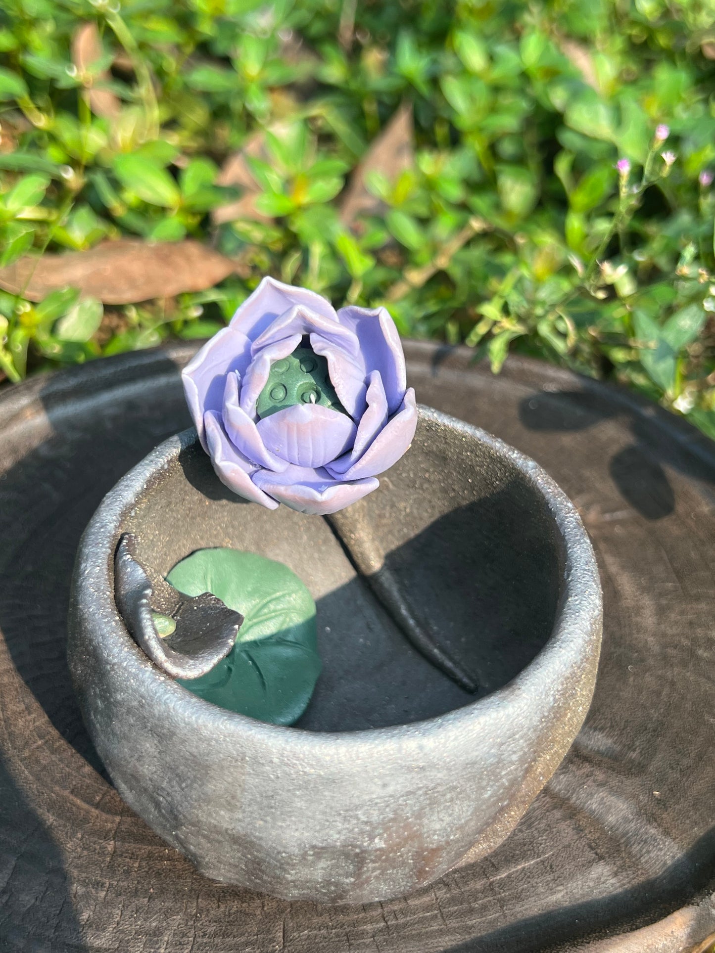 This is a woodfired tietai pottery flower teacup