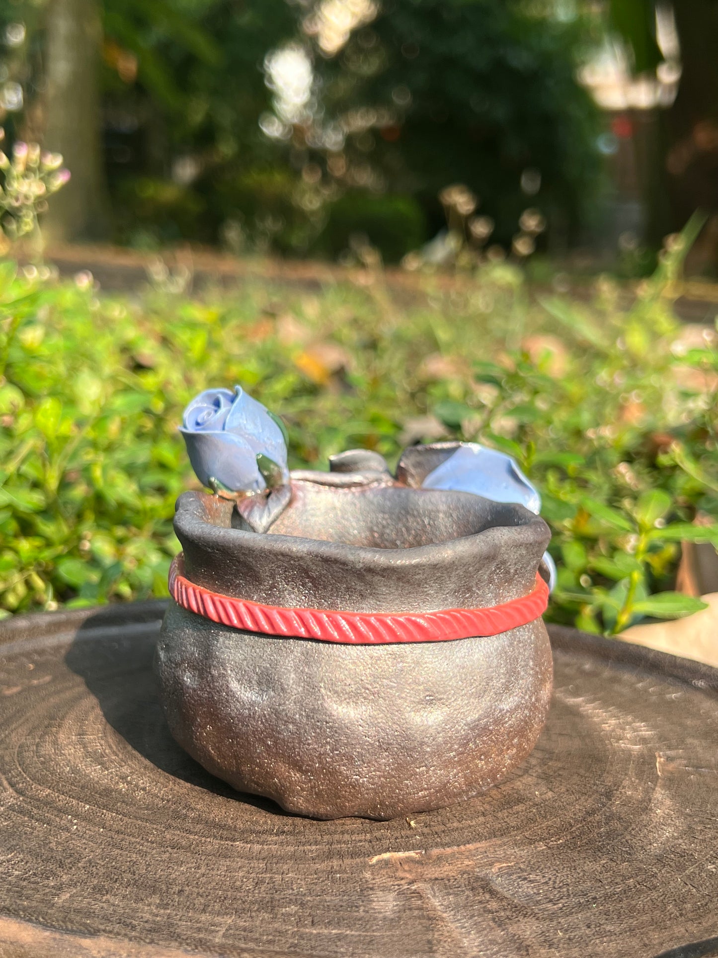 This is a woodfired tietai pottery flower teacup