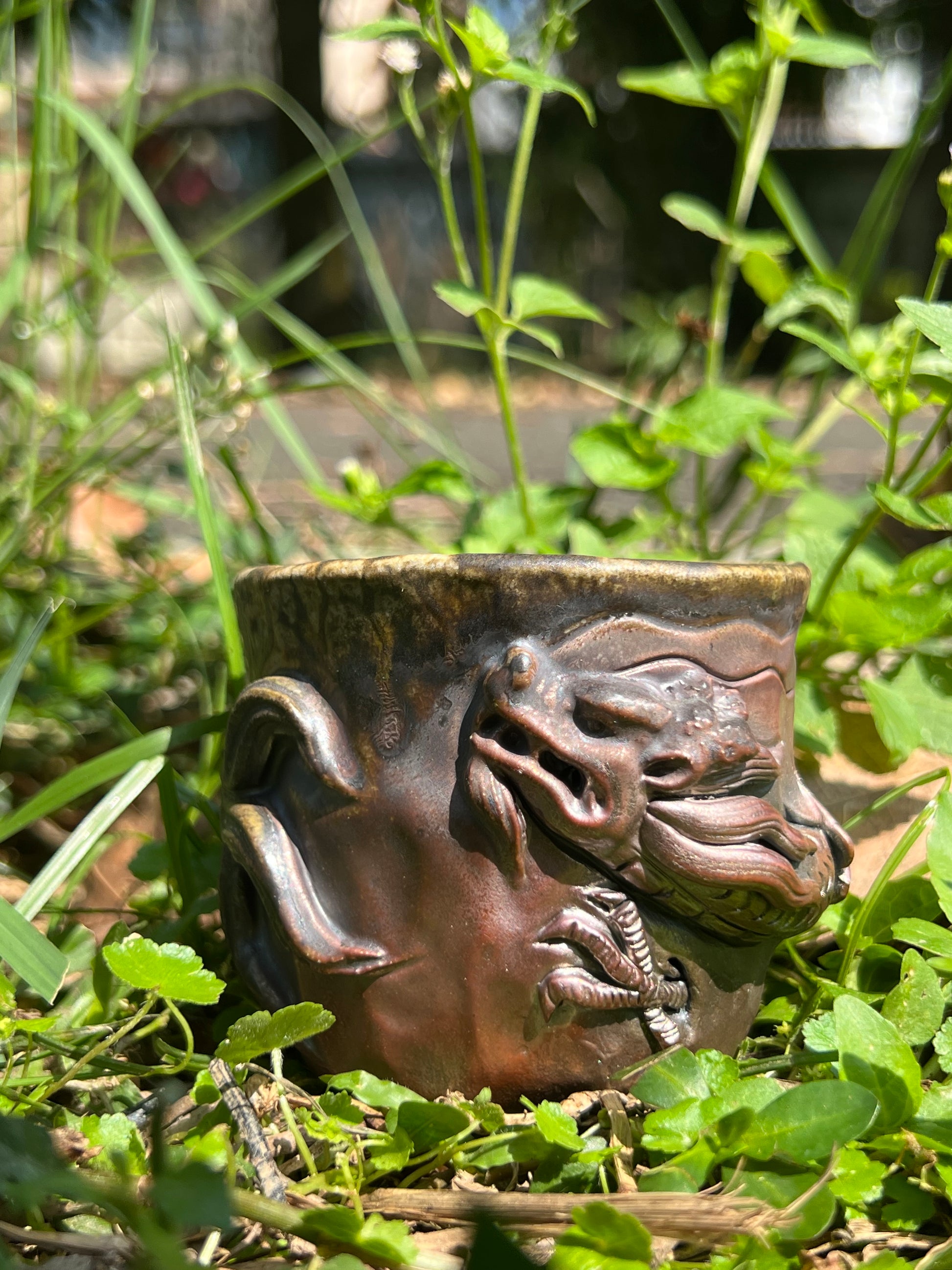 This is a woodfired tietai pottery dragon teacup