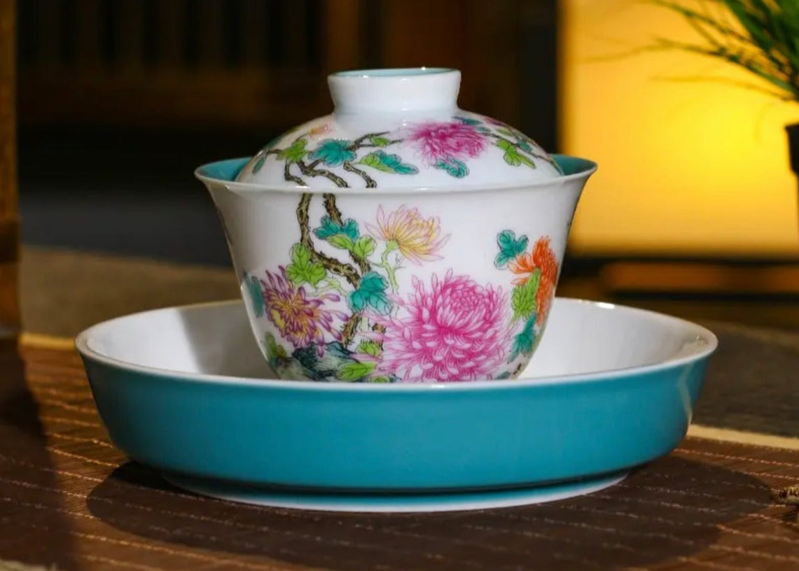 This is a Chinese Jingdezhen enamel chrysanthemum flower teapot gaiwan