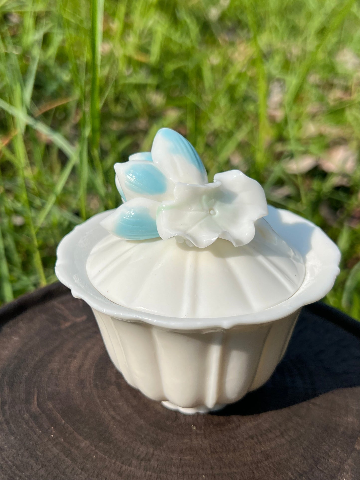 this is a woodfired white fine pottery flower teacup