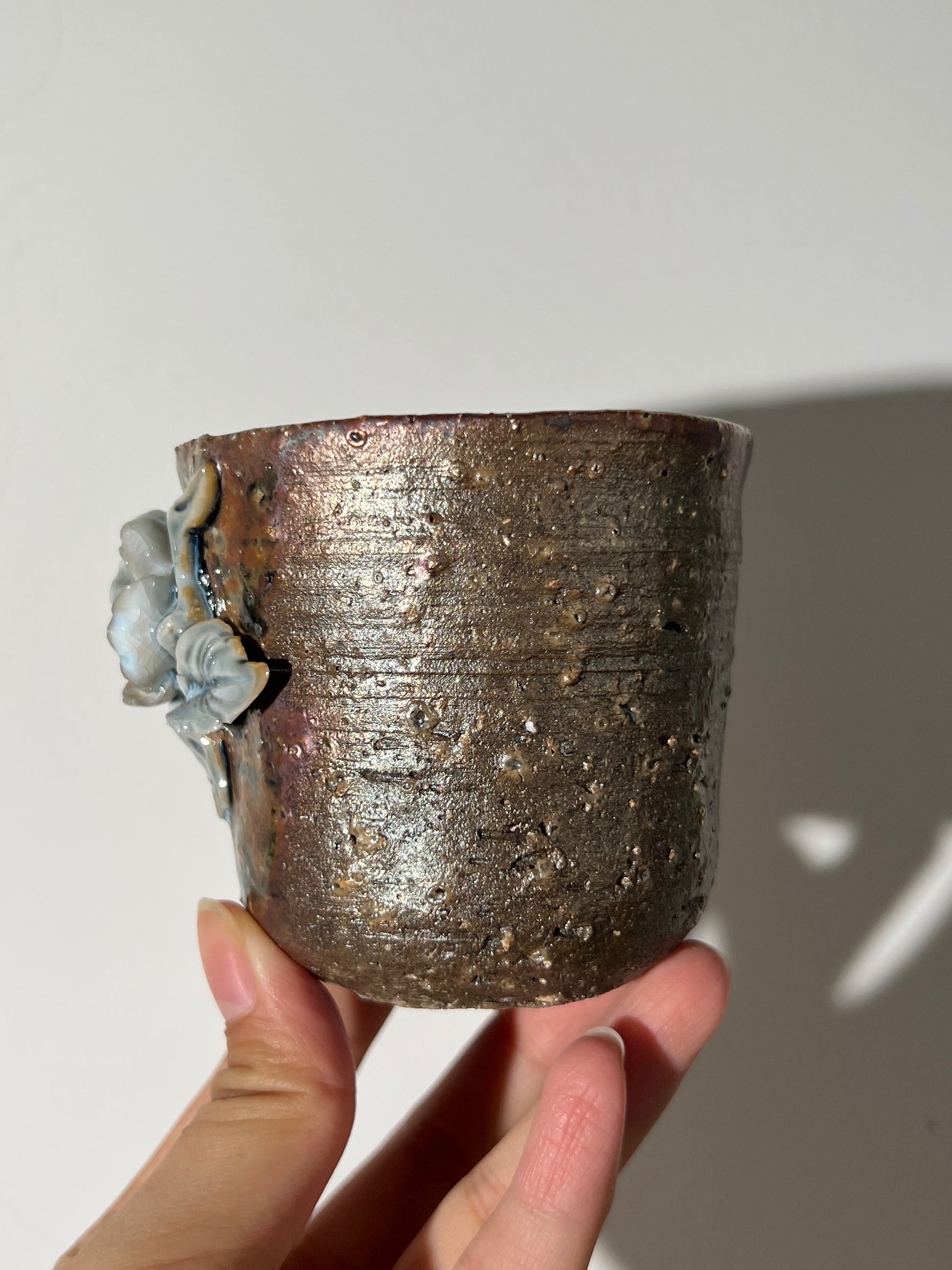 This is a woodfired tietai pottery flower faircup gongdaobei