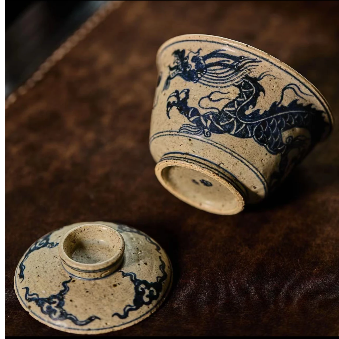 This is a Chinese Jingdezhen blue and white pottery dragon teapot gaiwan