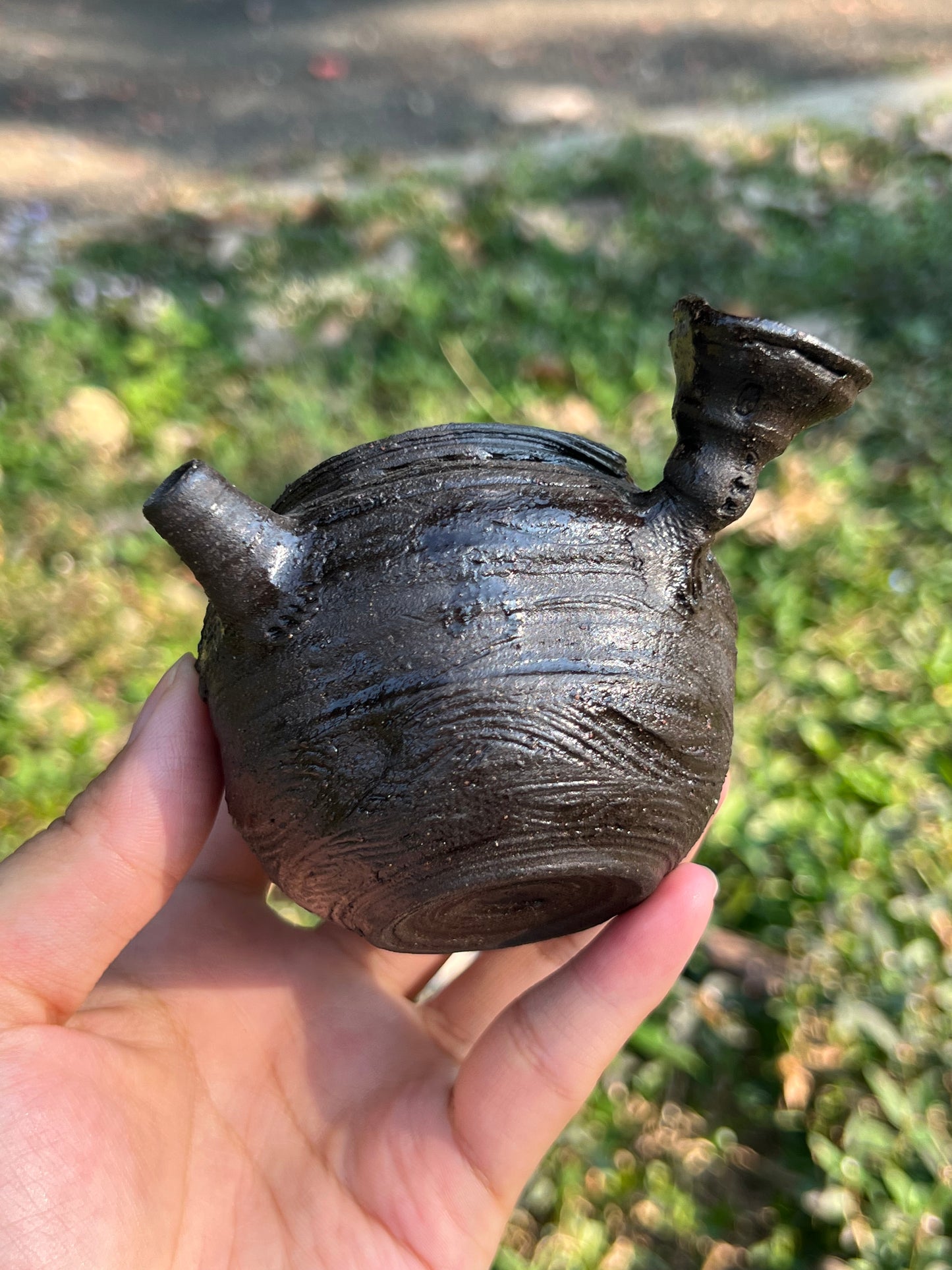 This is a purple clay teapot