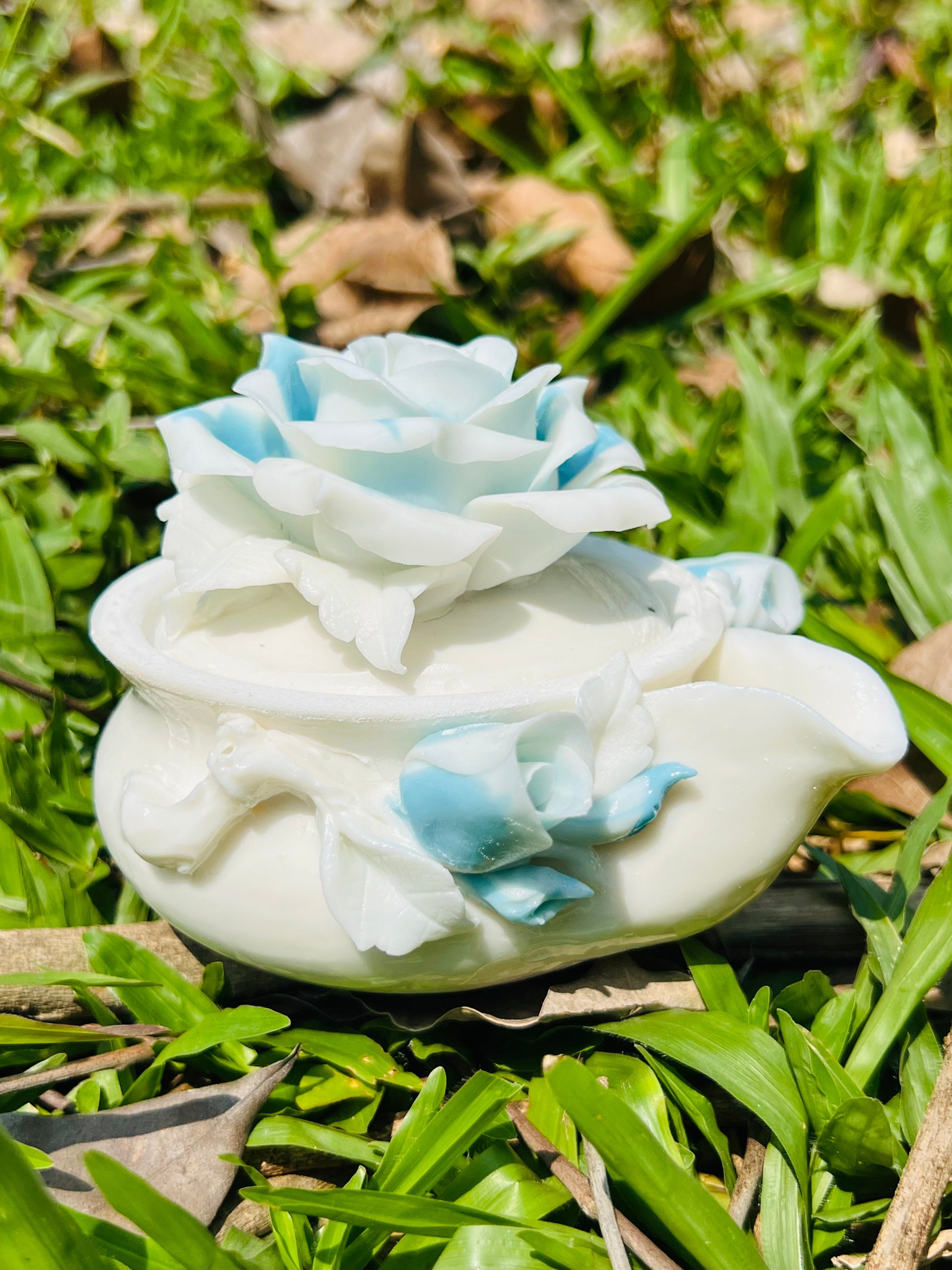 this is a woodfired white fine pottery flower teacup