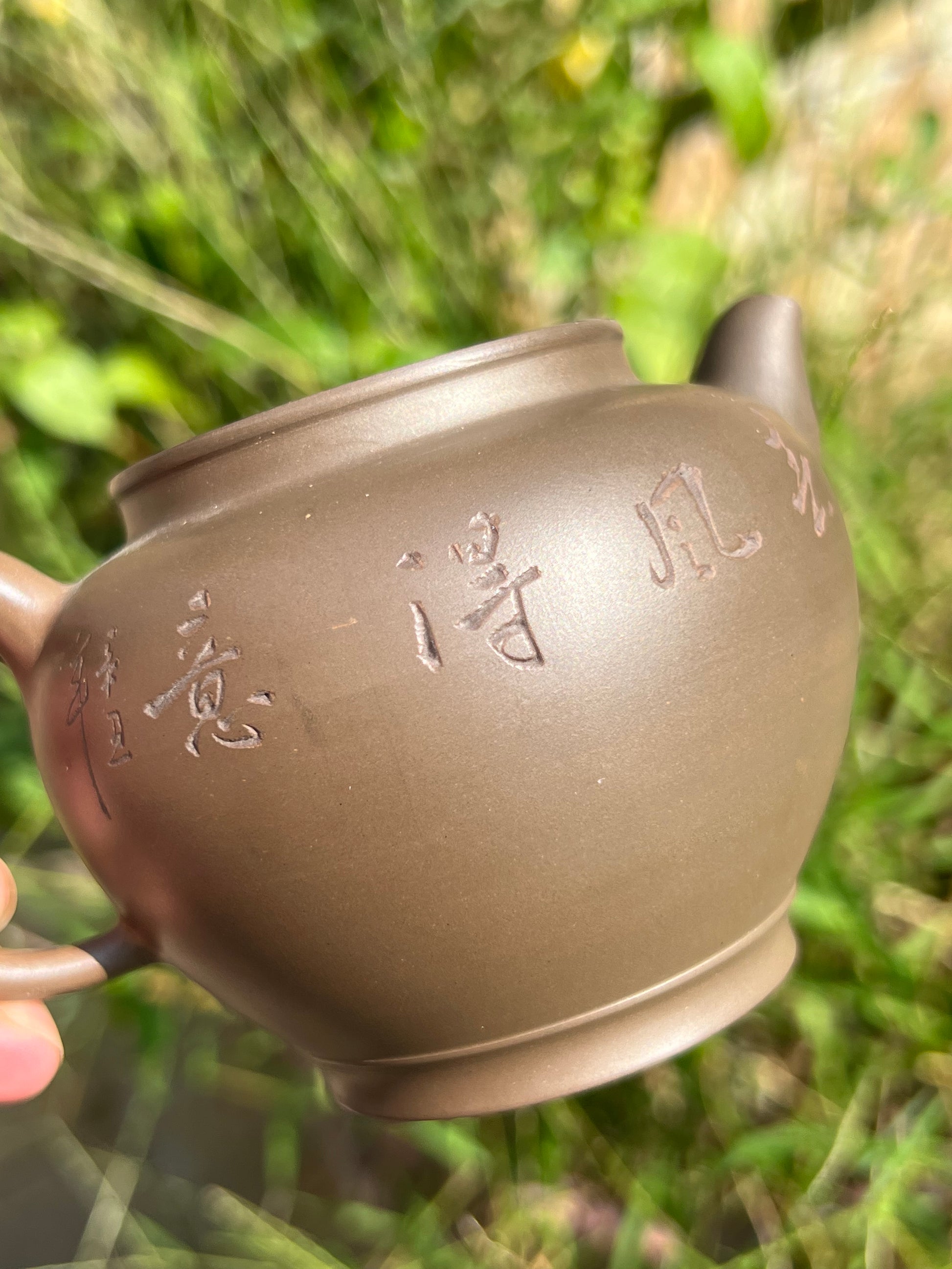 This is a Nixing teapot. this is Chinese Nixing pottery clay teapot