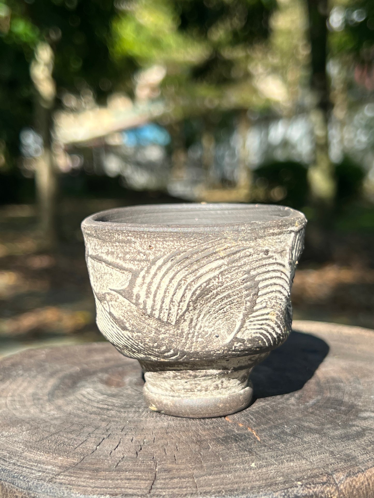 This is a pottery teacup