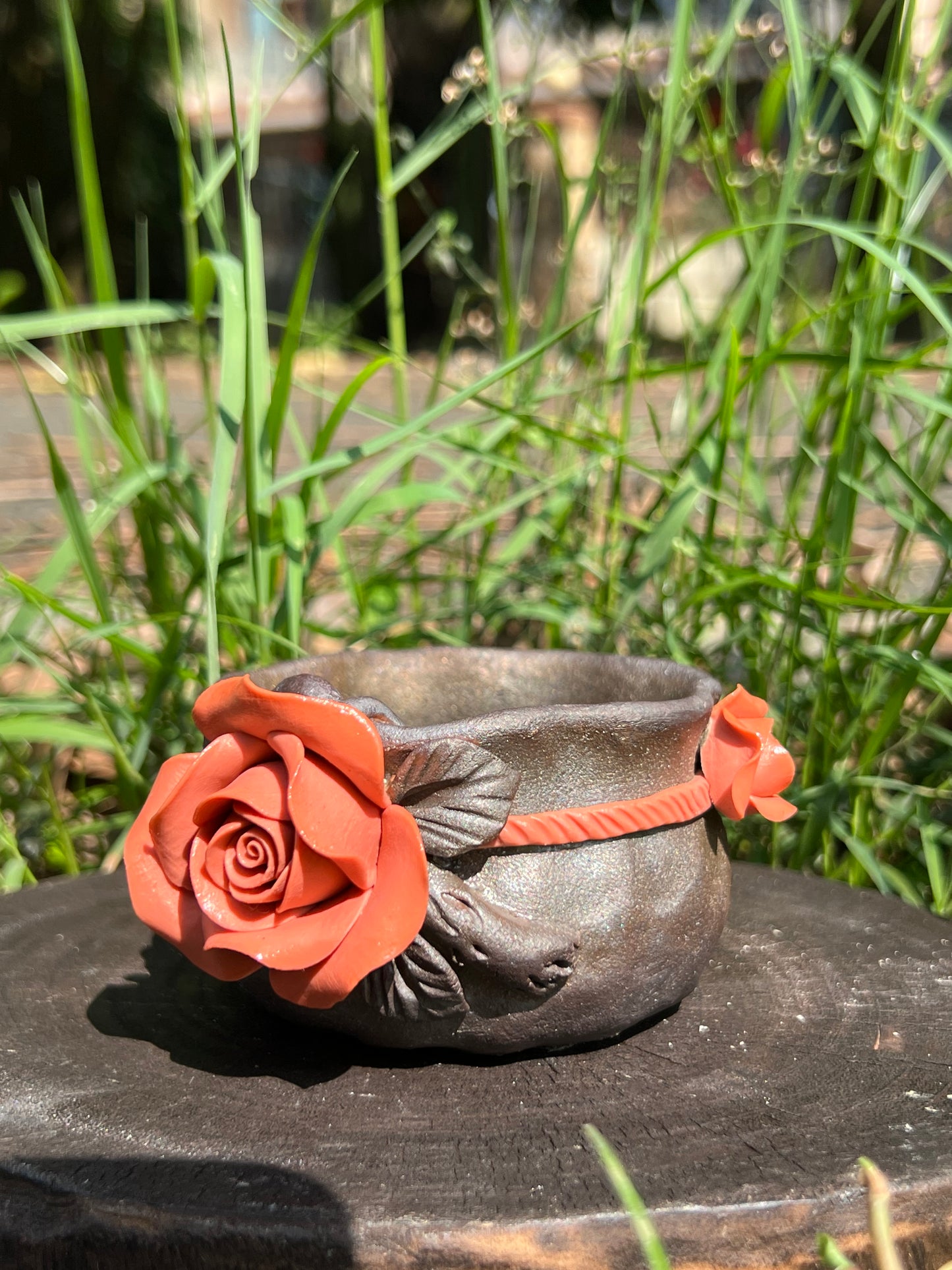 This is a woodfired tietai pottery flower teacup