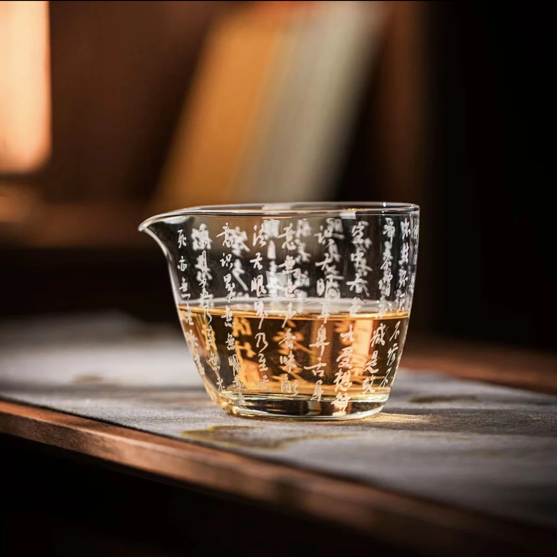 This is a hand engraved heart sutra glass faircup gongdaobei