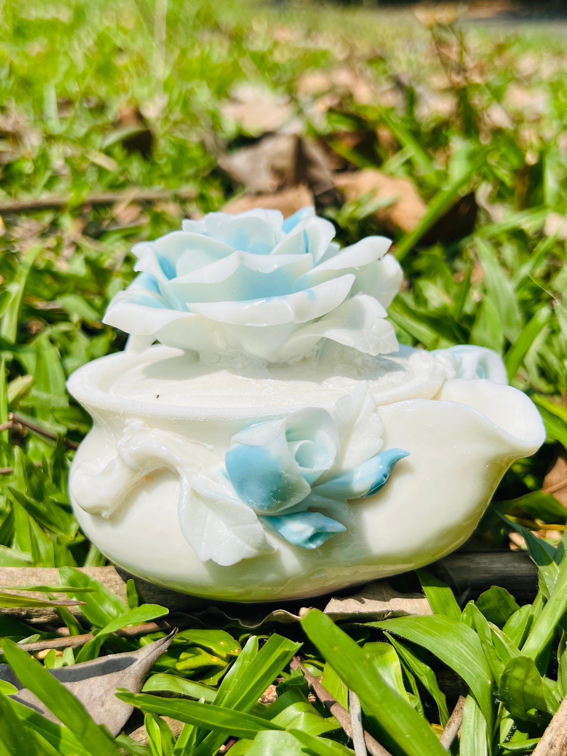 this is a woodfired white fine pottery flower teacup