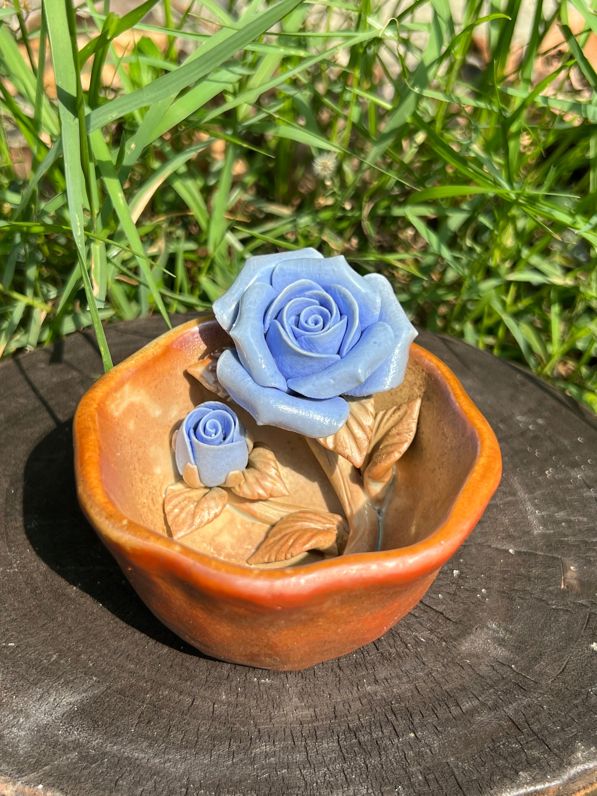 This is a woodfired pottery flower teacup