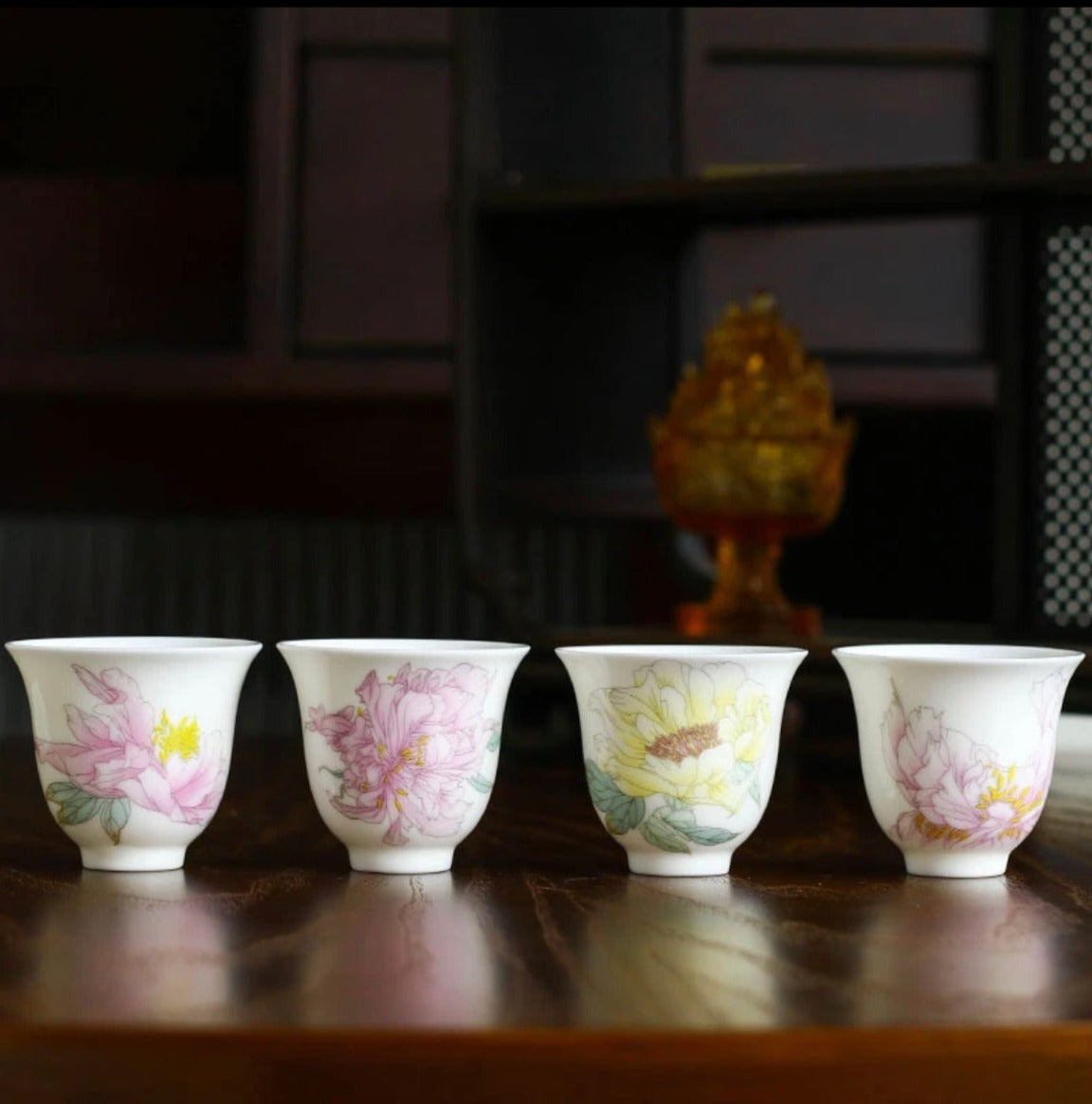 This is a Chinese Jingdezhen pastel flower teacup