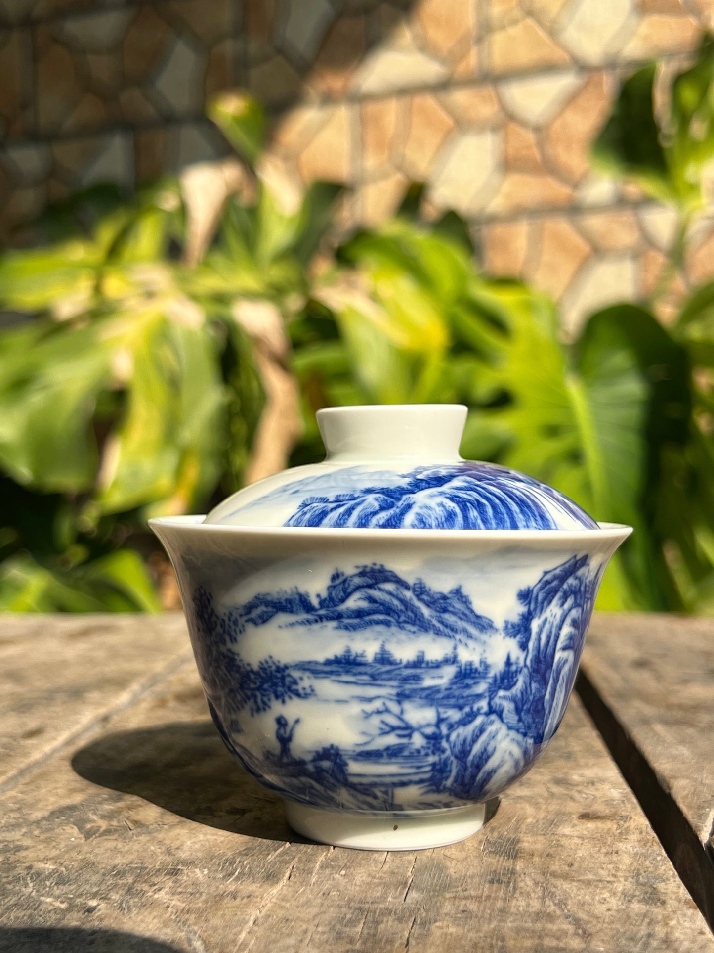 This is a Chinese Jingdezhen blue and white porcelain landscape teapot gaiwan