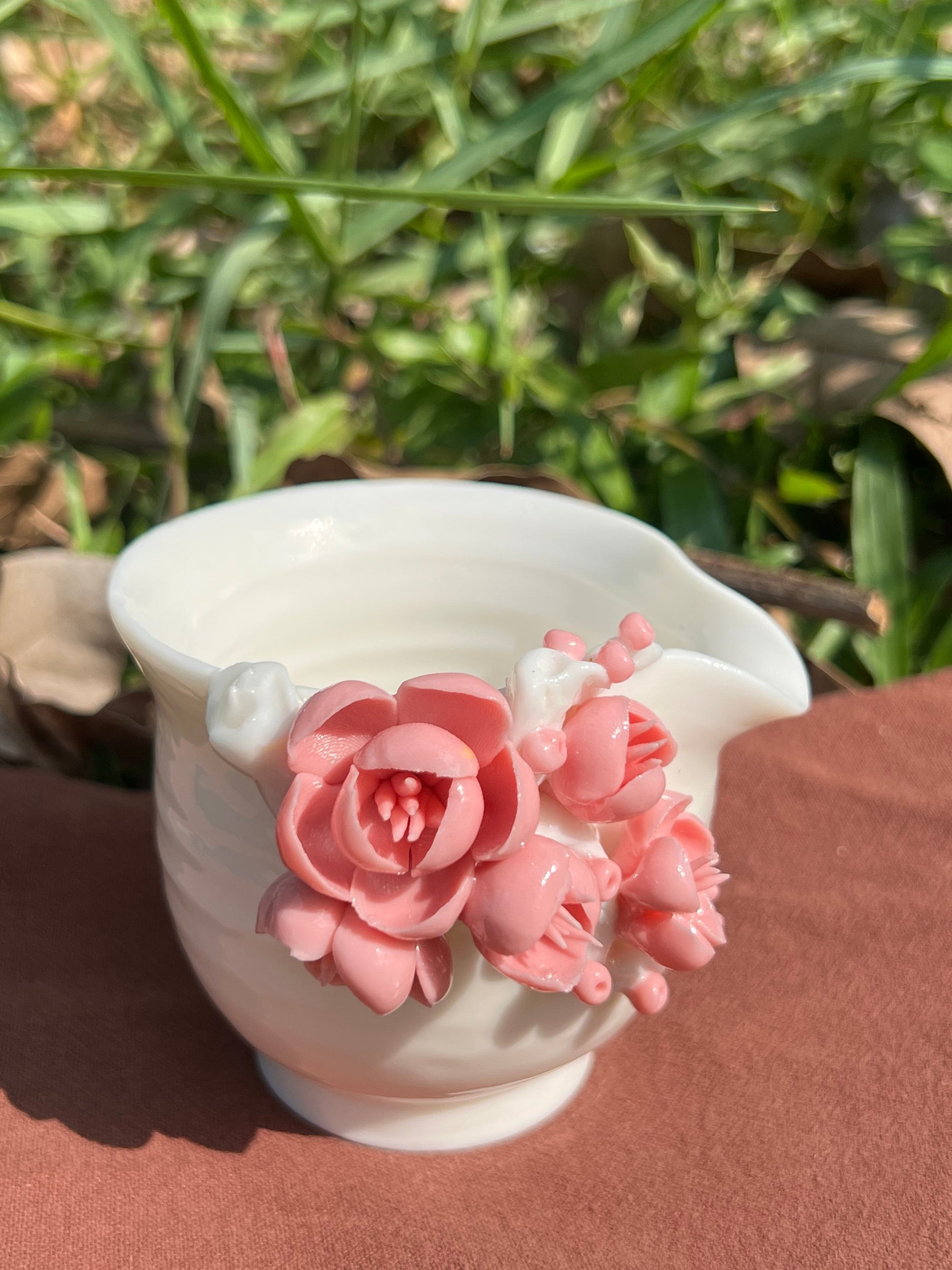 This is a woodfired white pottery flower faircup gongdaobei