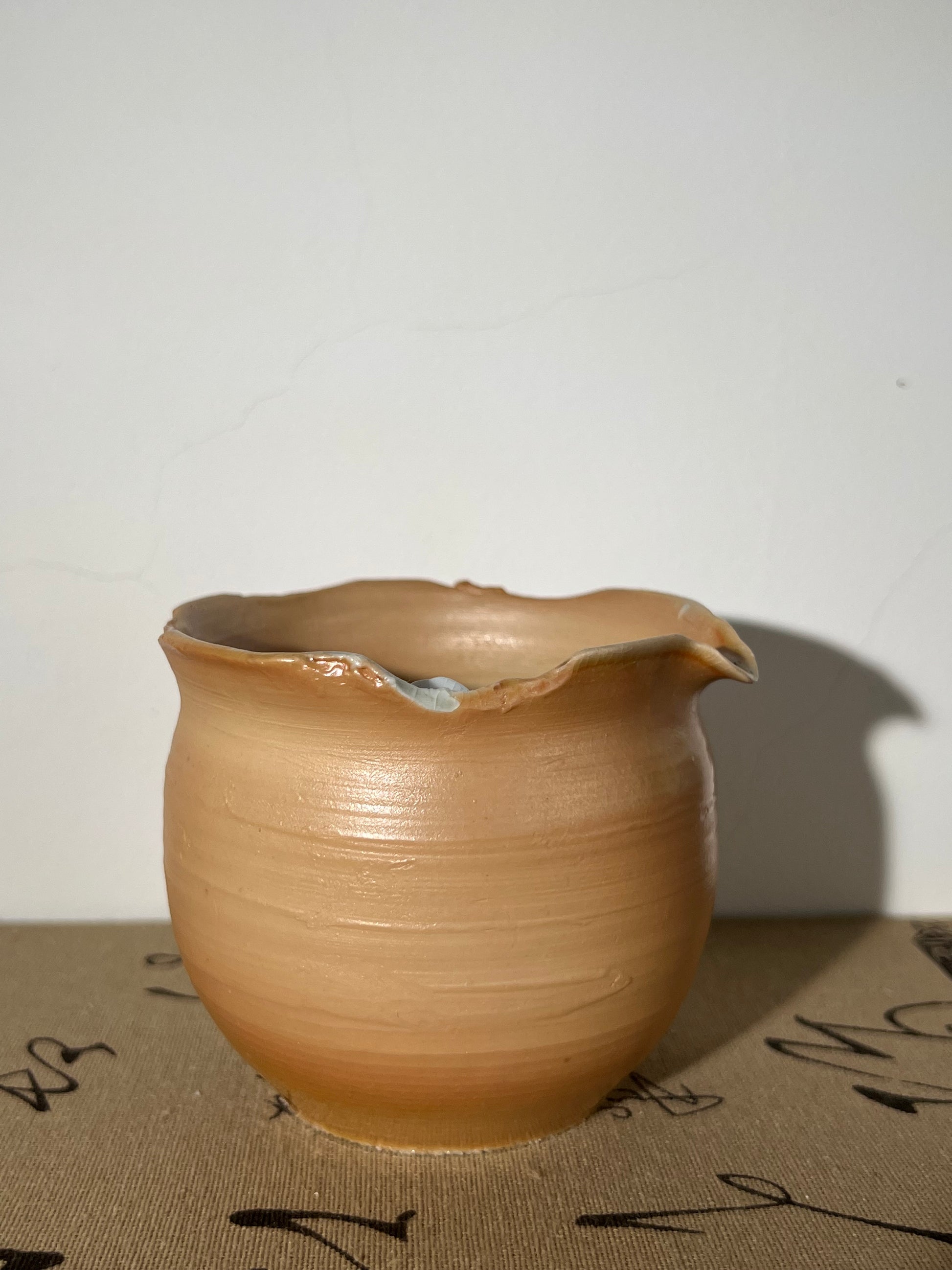 This is a woodfired pottery flower faircup gongdaobei