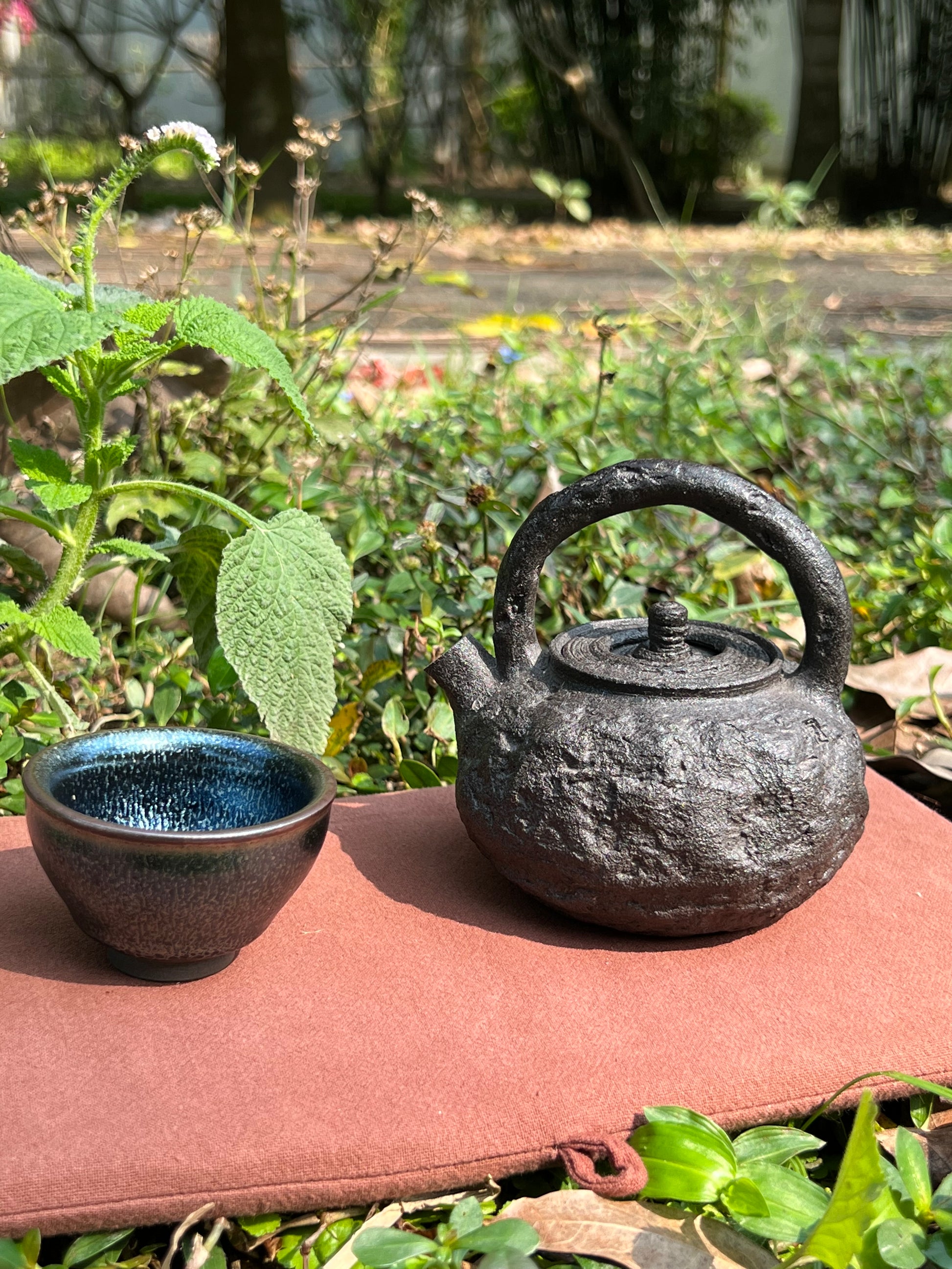 this is a purple clay teapot