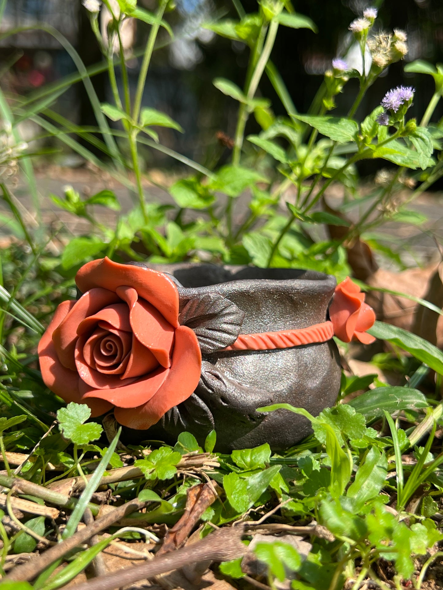 This is a woodfired tietai pottery flower teacup