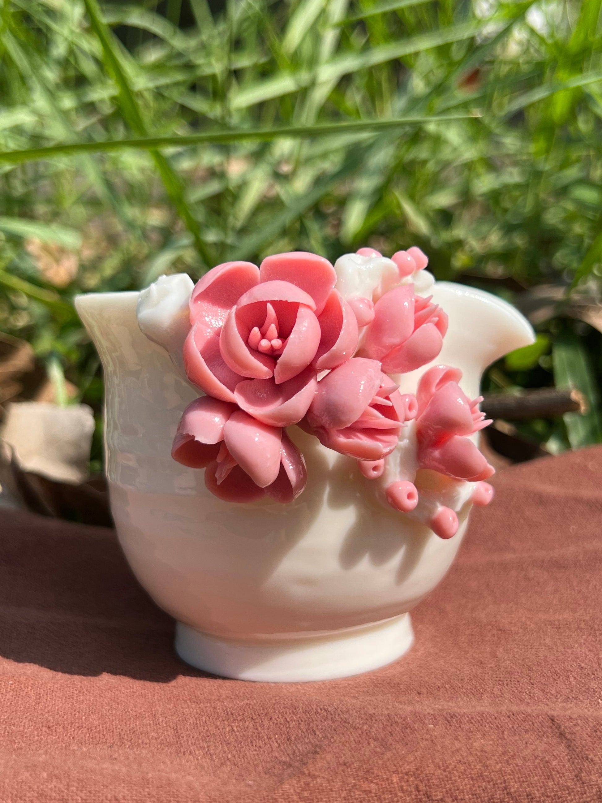 This is a woodfired white pottery flower faircup gongdaobei