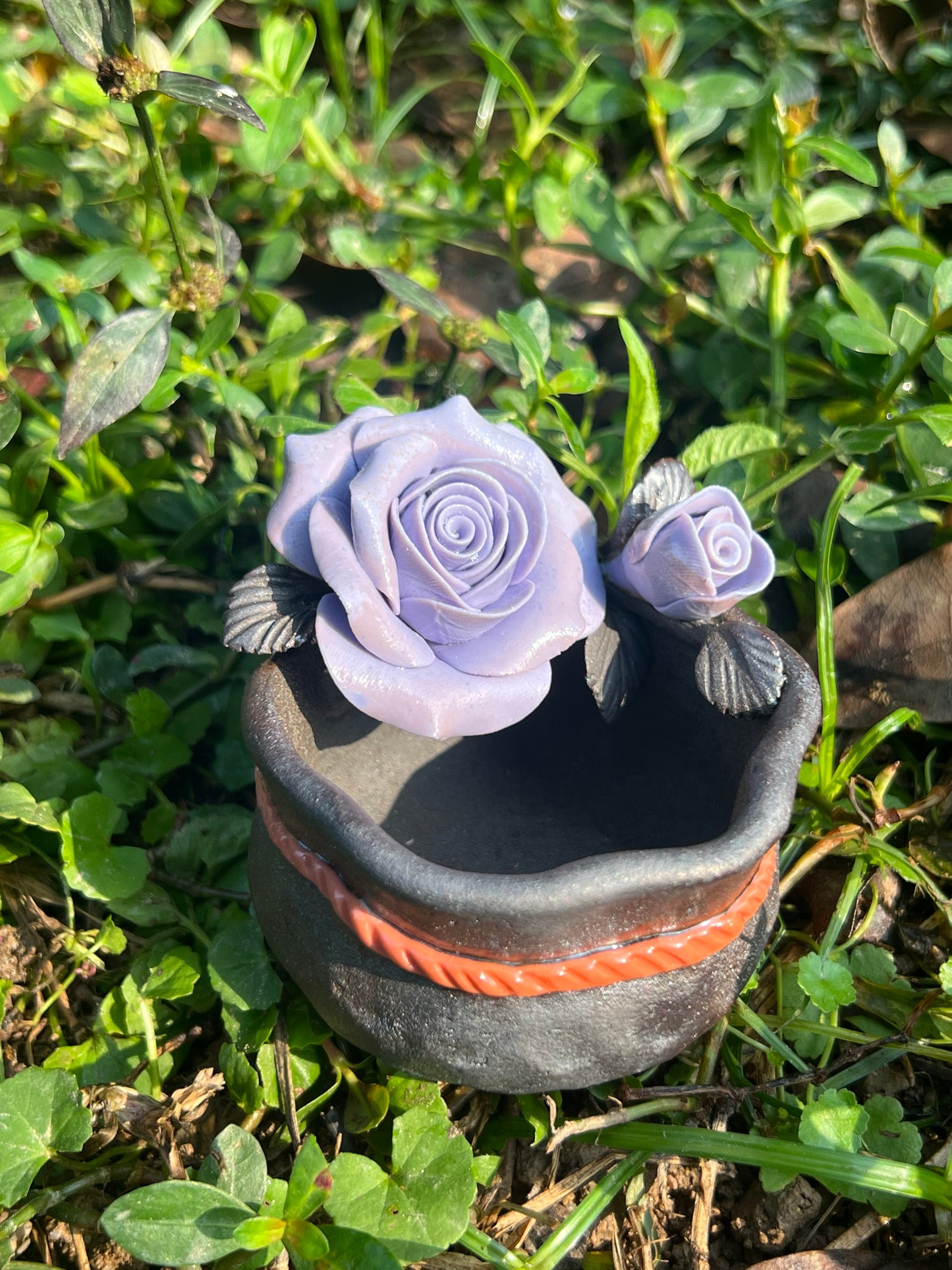 This is a woodfired tietai pottery flower teacup