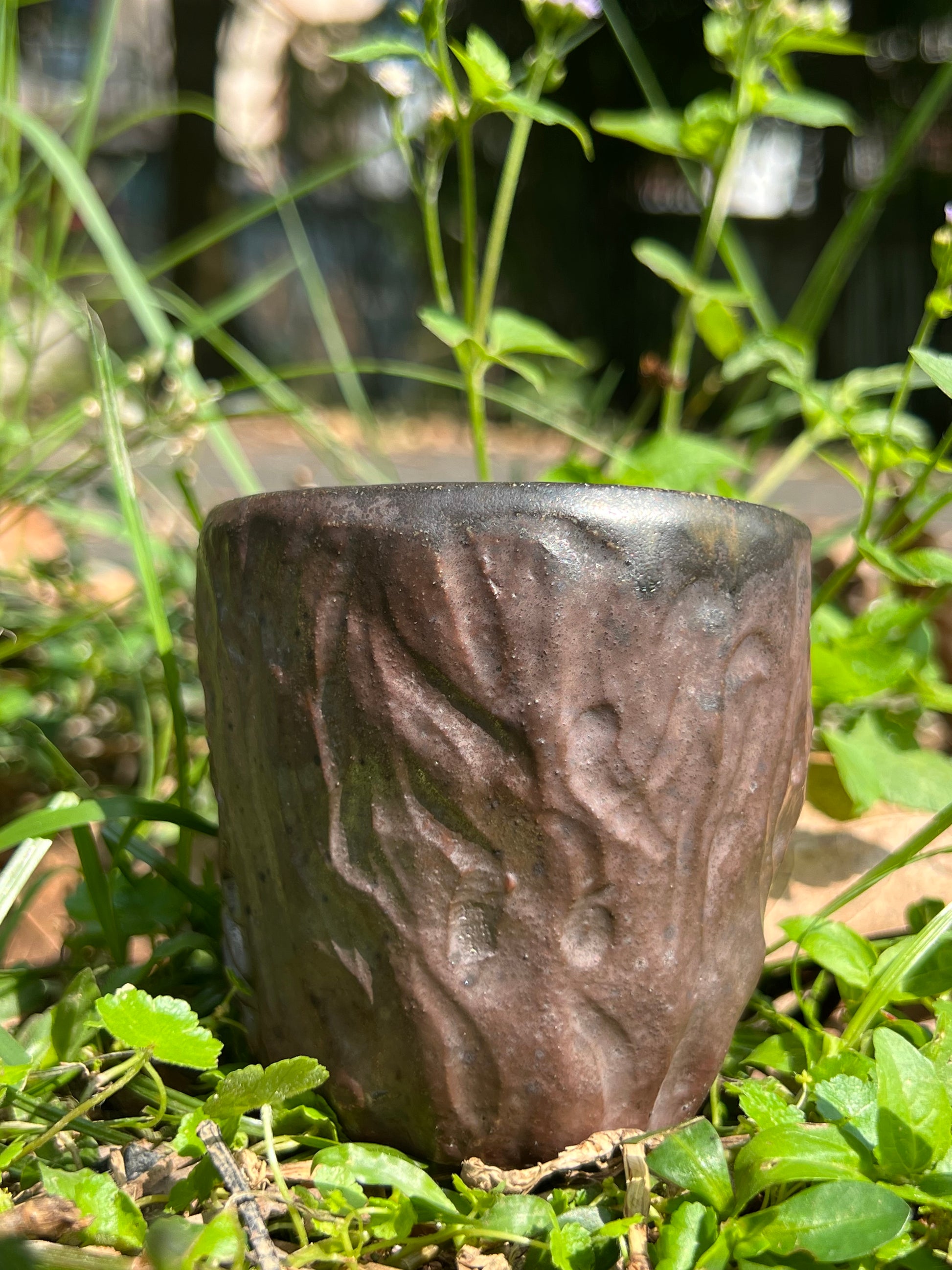 This is a woodfired tietai pottery phoenix  teacup