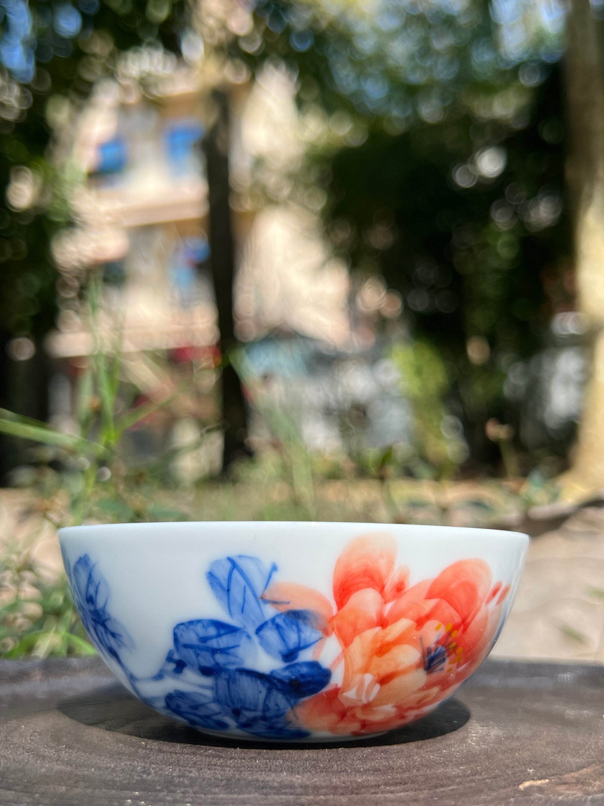 This is a Chinese Jingdezhen blue and white porcelain peony flower teacup