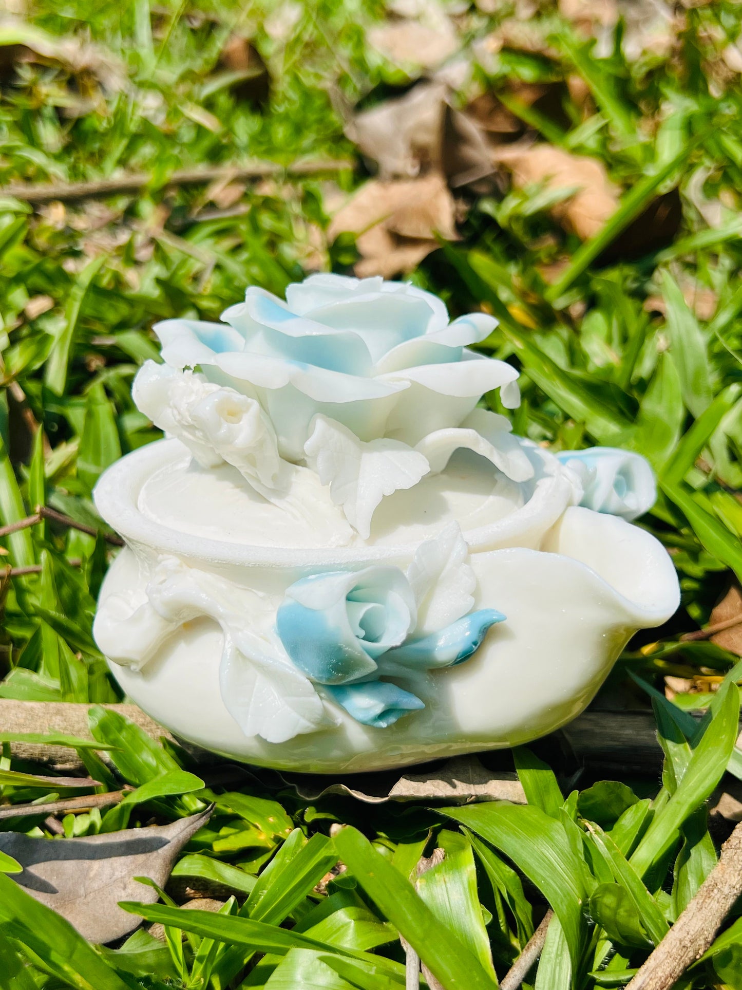 this is a woodfired white fine pottery flower teacup