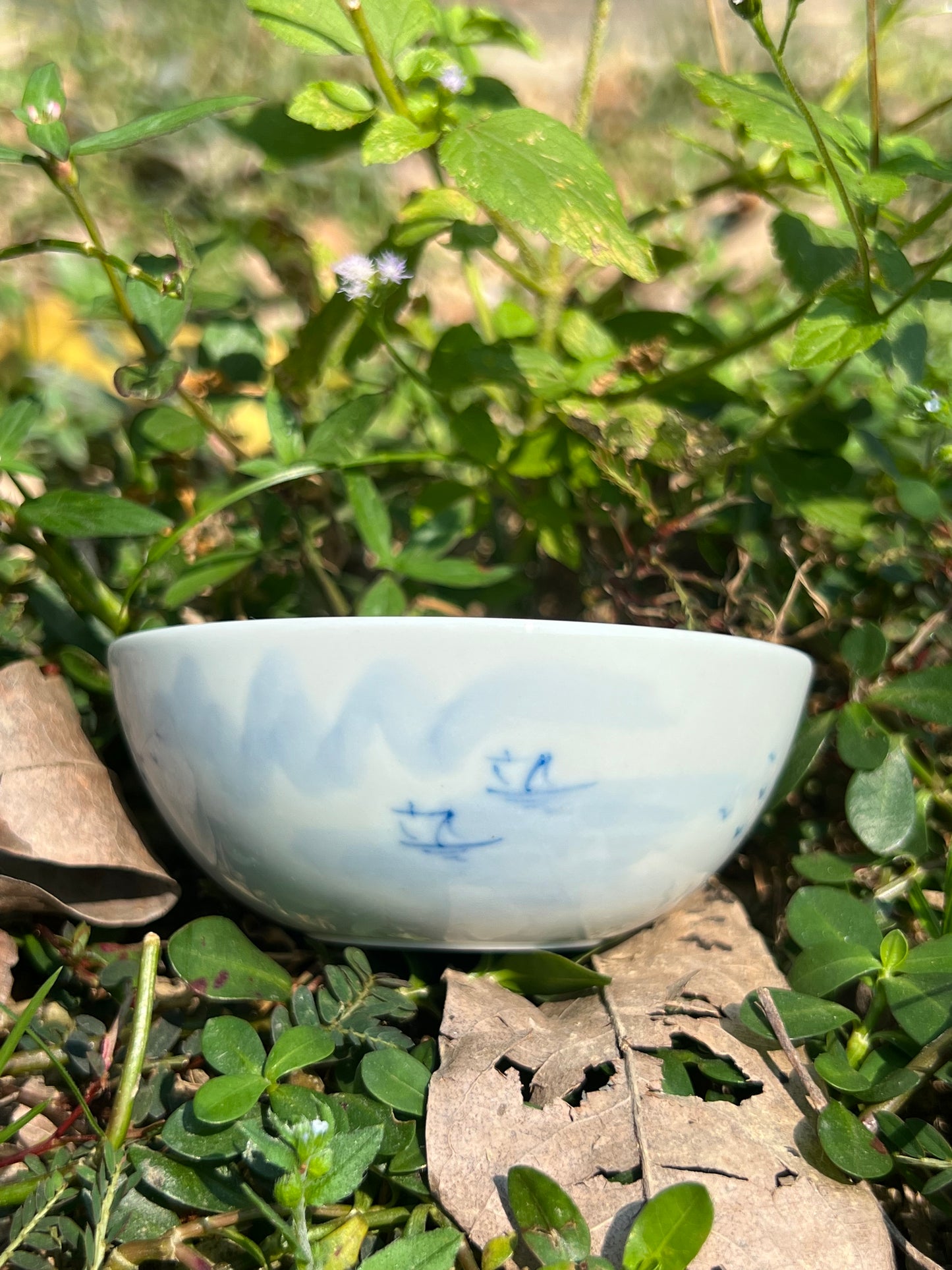 This is a Chinese Jingdezhen blue and white porcelain landscape teacup