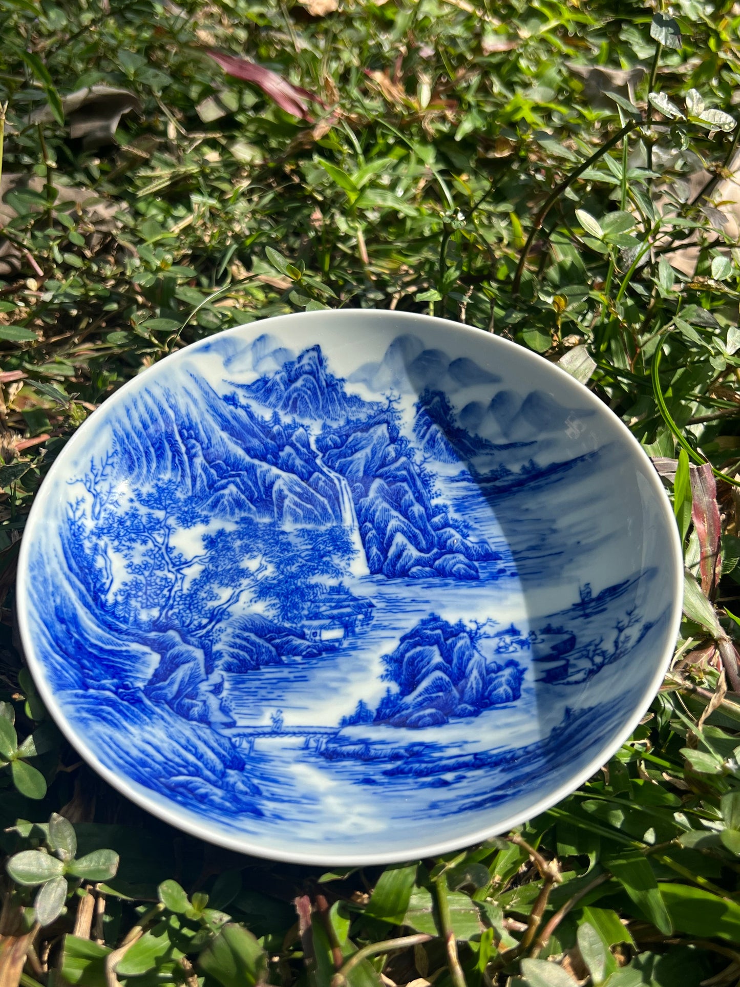 This is a Chinese Jingdezhen blue and white porcelain landscape teapot gaiwan