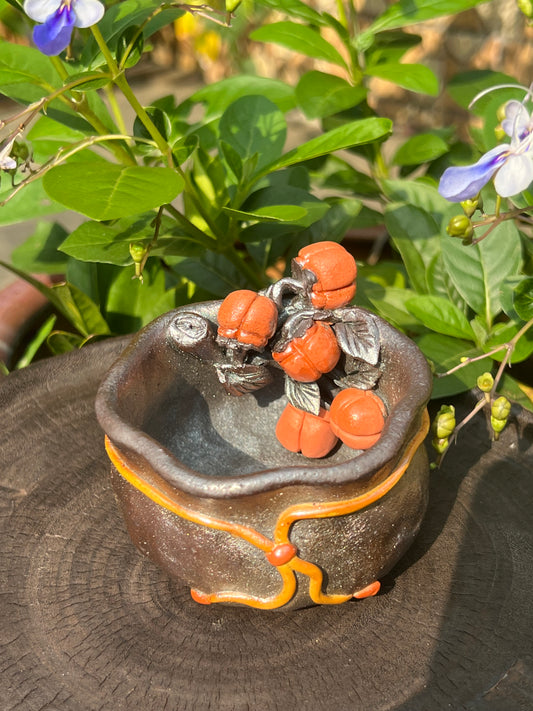 This is a woodfired tietai pottery flower teacup