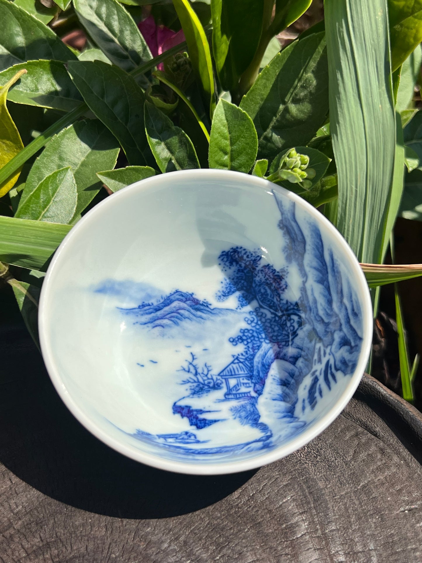 This is a Chinese Jingdezhen blue and white porcelain landscape teacup