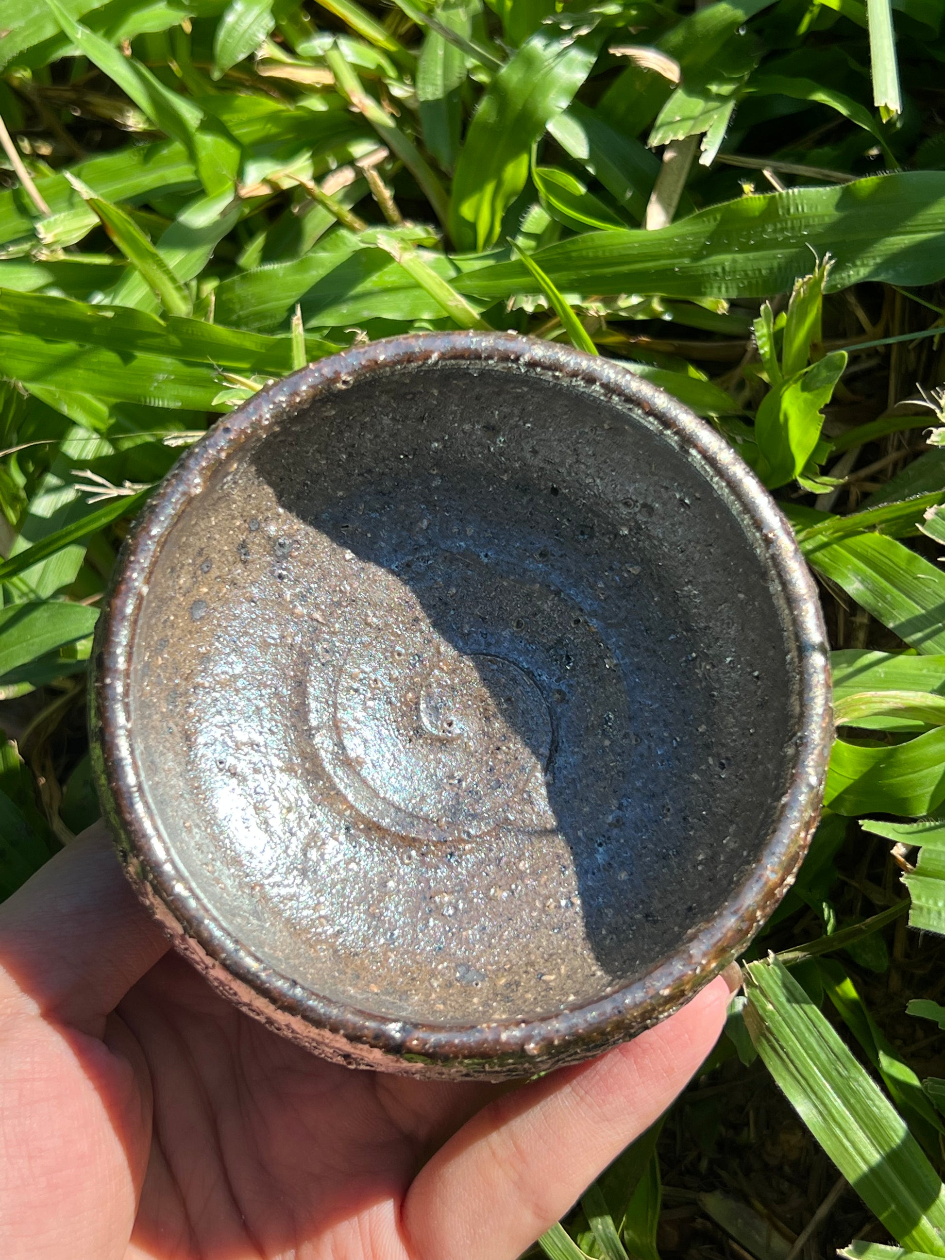 This is a woodfired tietai pottery teacup