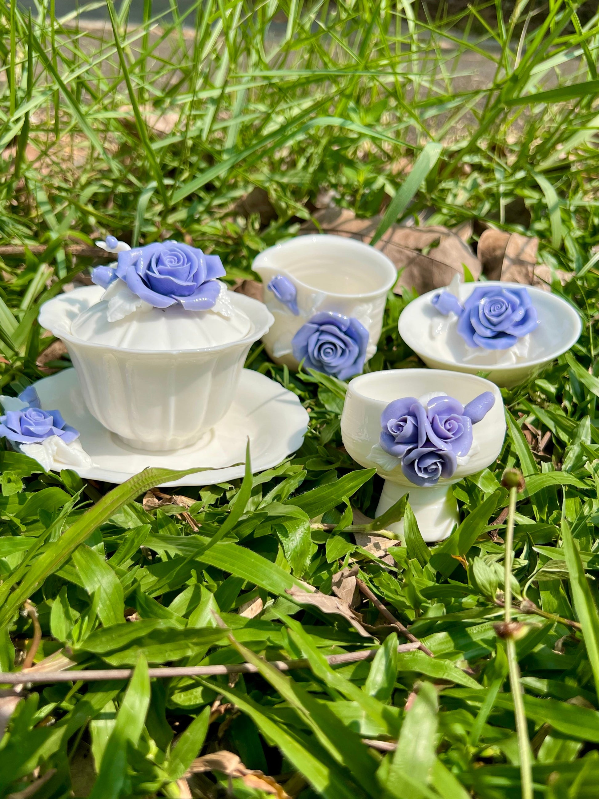 this is a woodfired white fine pottery flower teacup