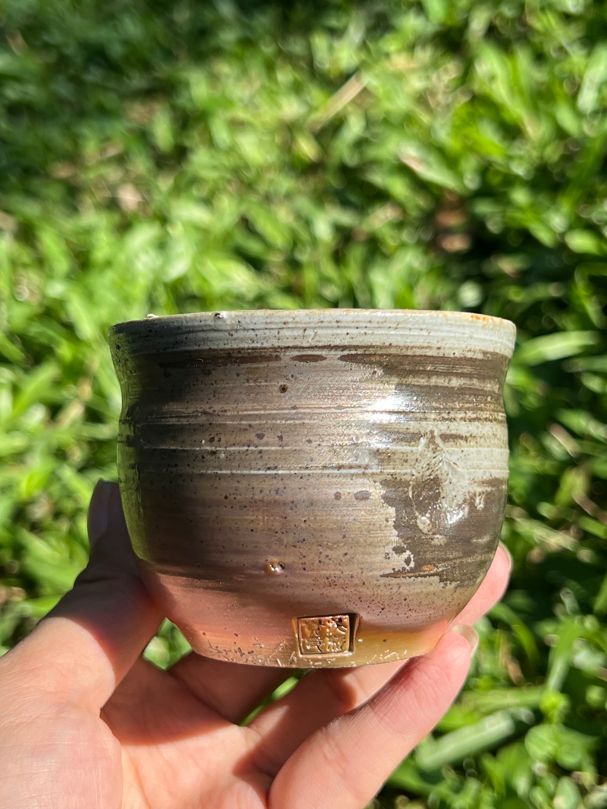 This is a woodfired pottery flower faircup gongdaobei