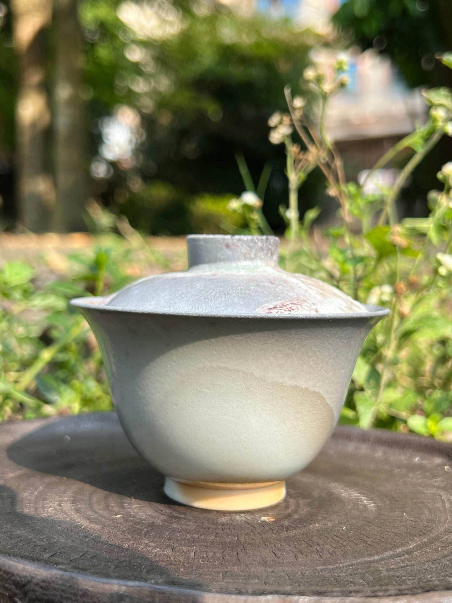 This is a woodfired pottery teapot gaiwan