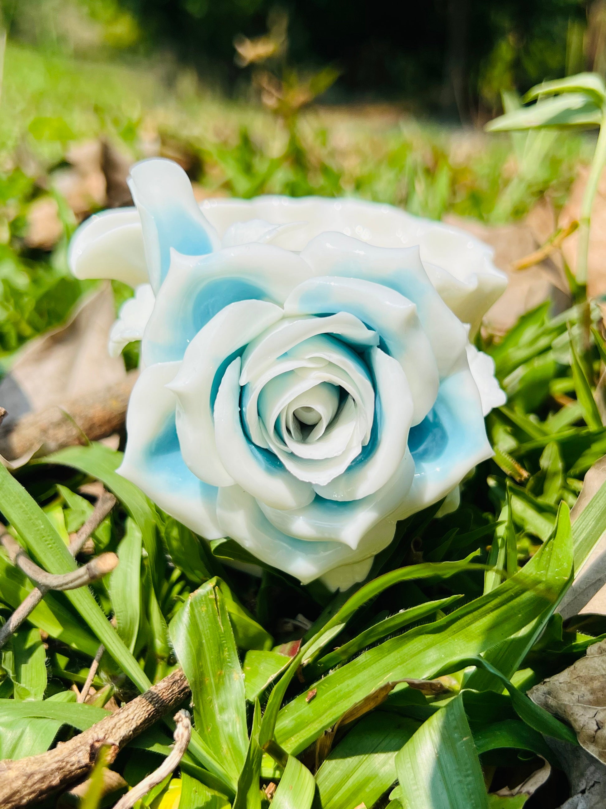 this is a woodfired white fine pottery flower teacup