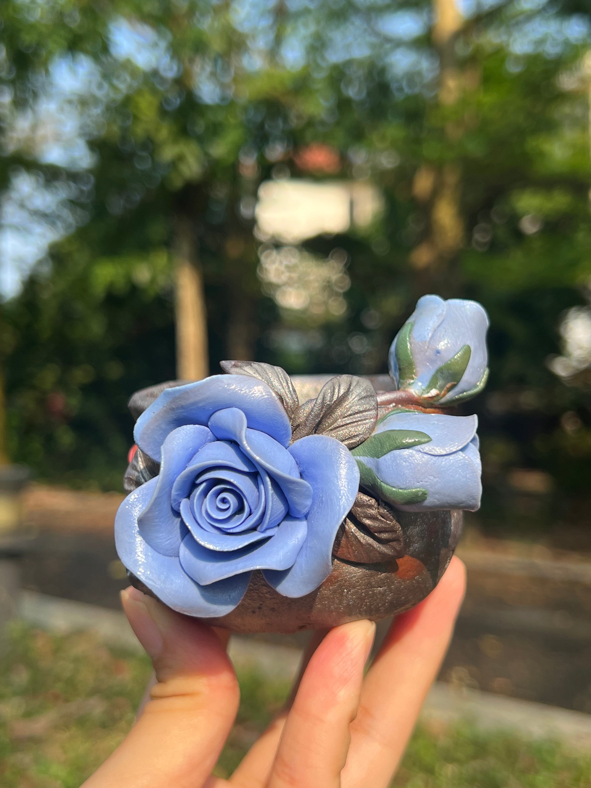 This is a woodfired tietai pottery flower teacup