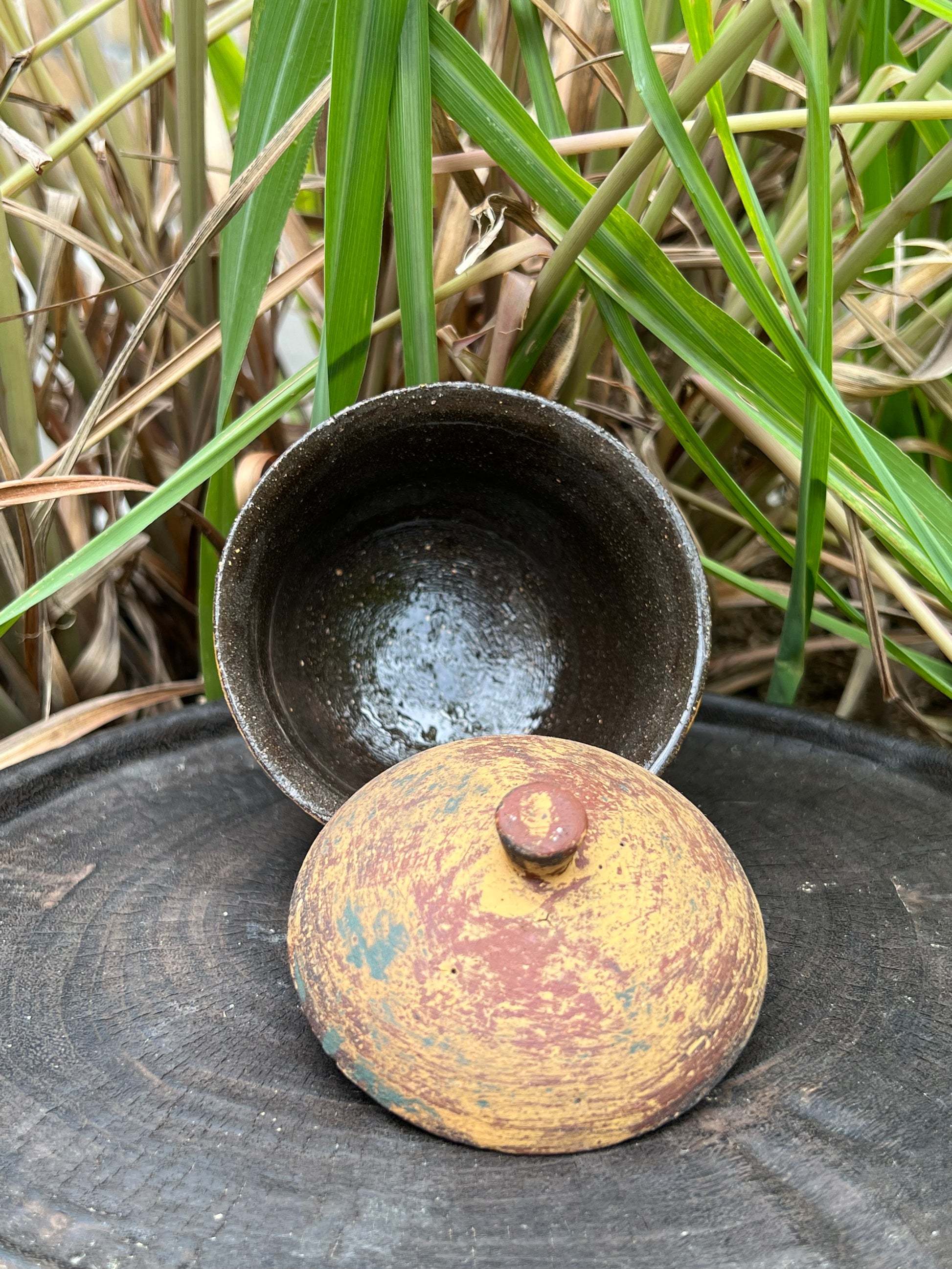 this is a pottery gaiwan.