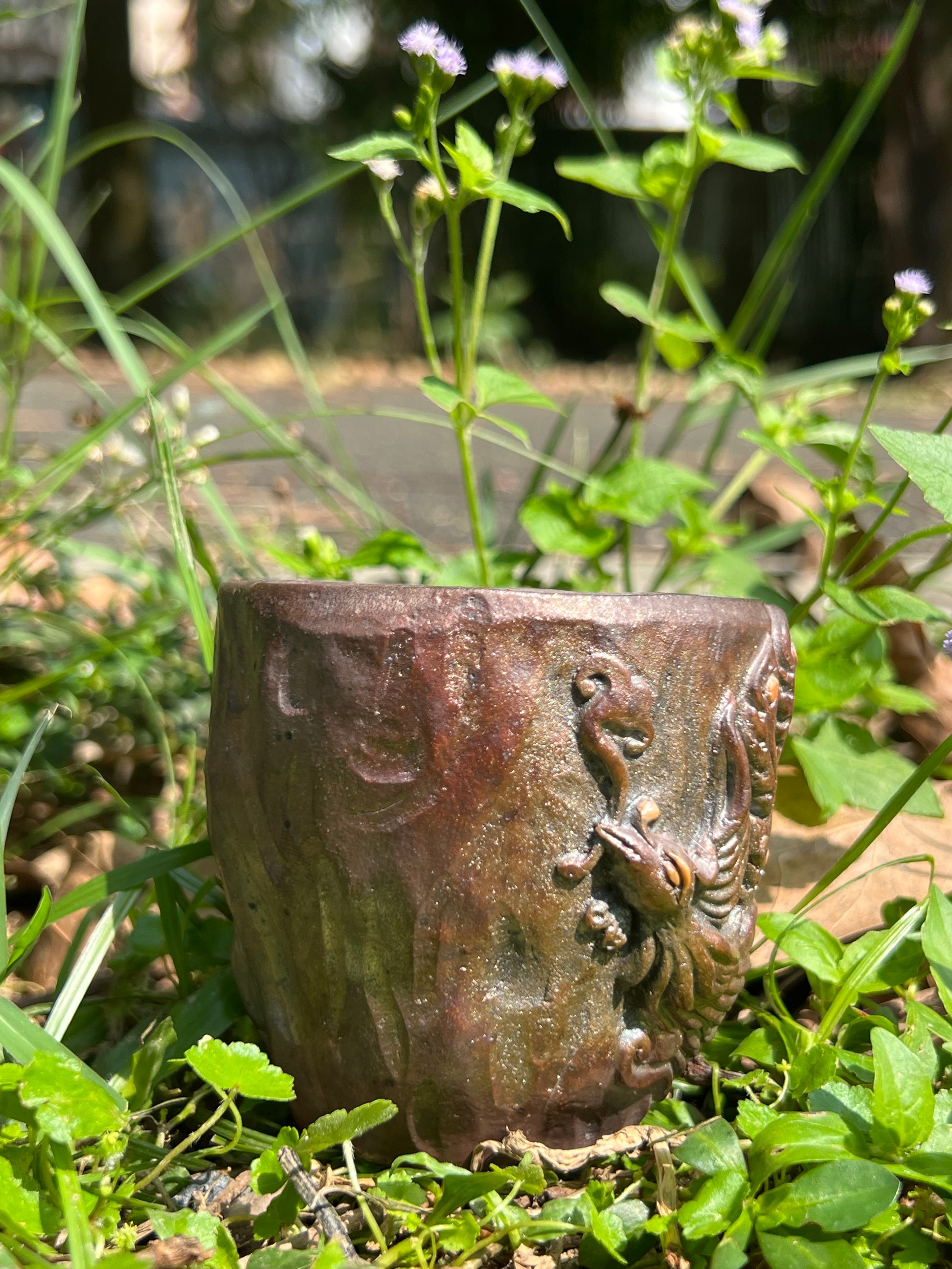 This is a woodfired tietai pottery phoenix  teacup