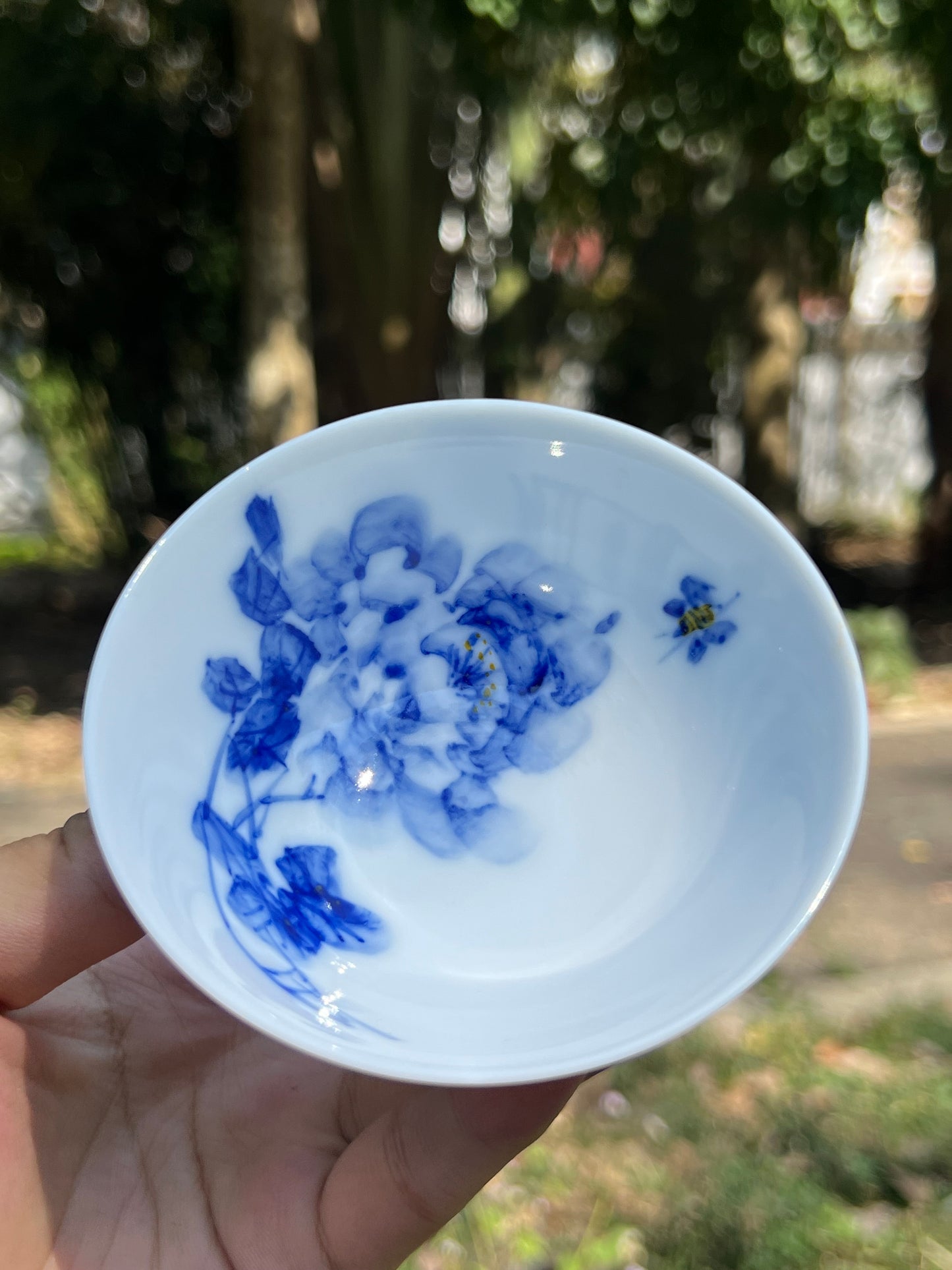 This is a Chinese Jingdezhen blue and white porcelain landscape teacup