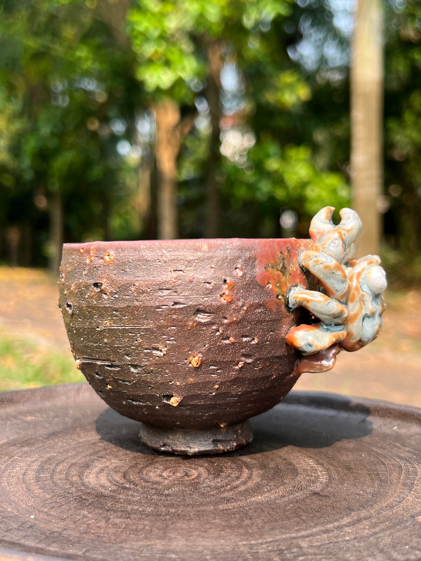 This is a woodfired pottery teacup