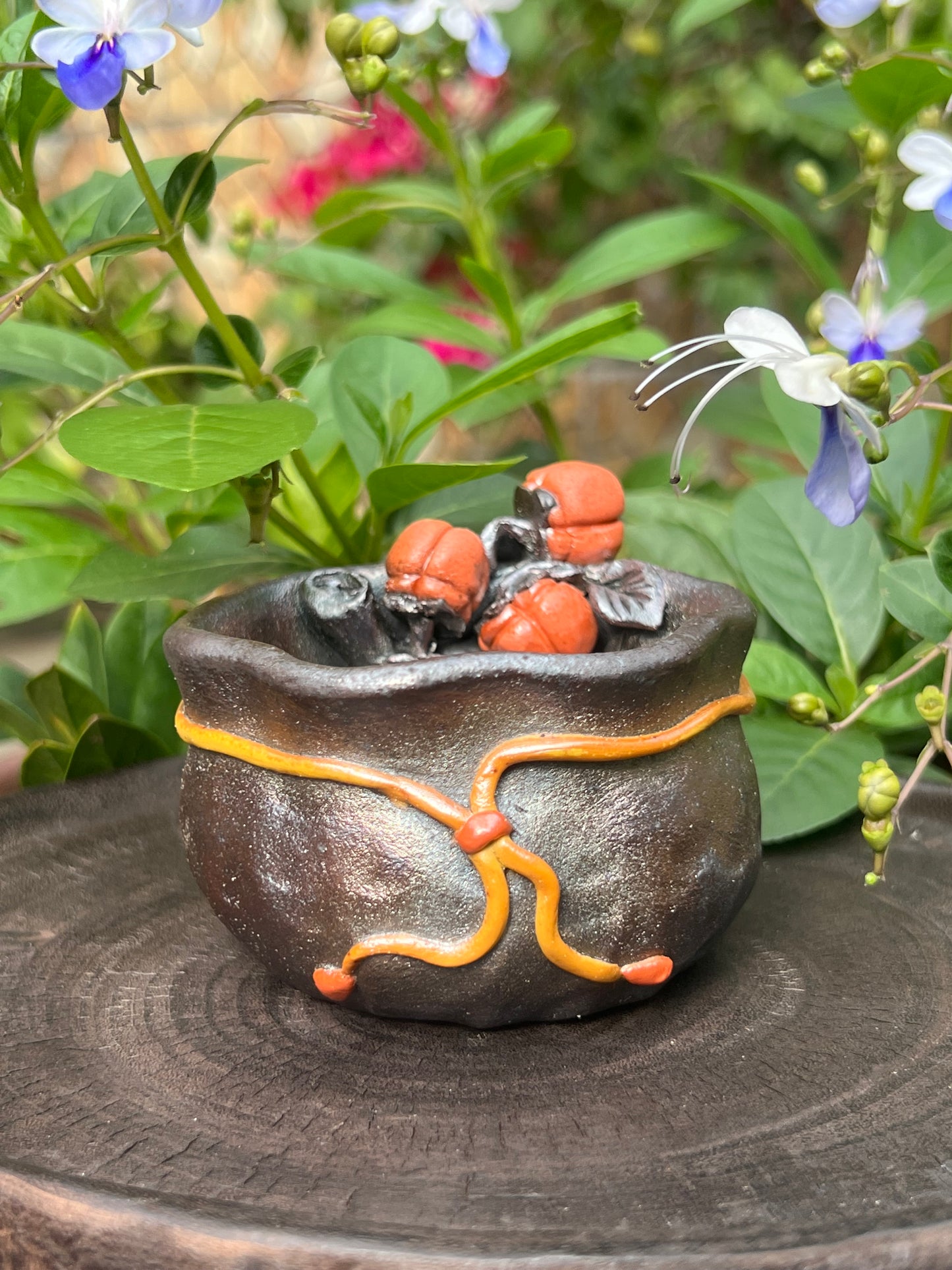 This is a woodfired tietai pottery flower teacup