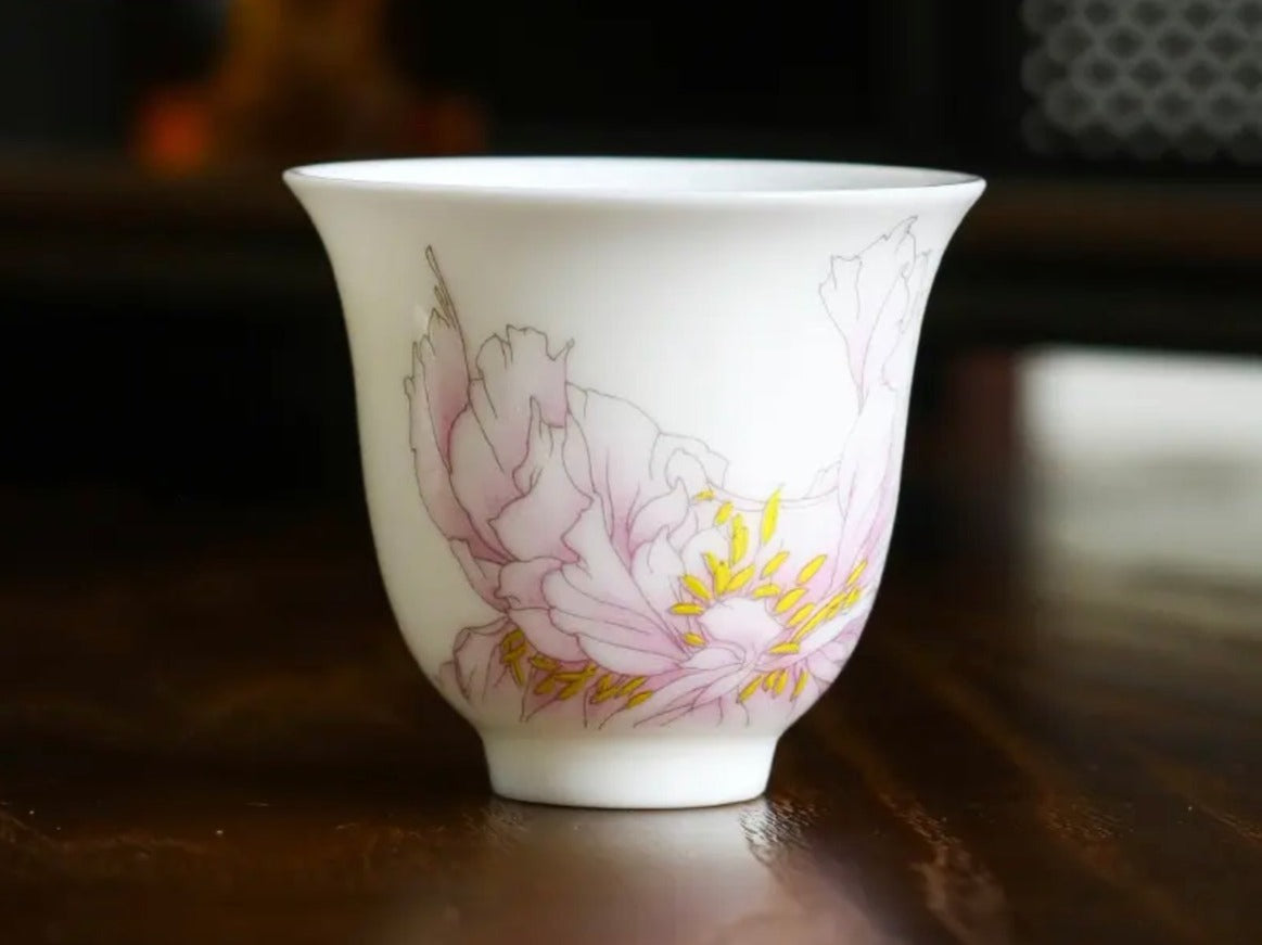 This is a Chinese Jingdezhen pastel flower teacup