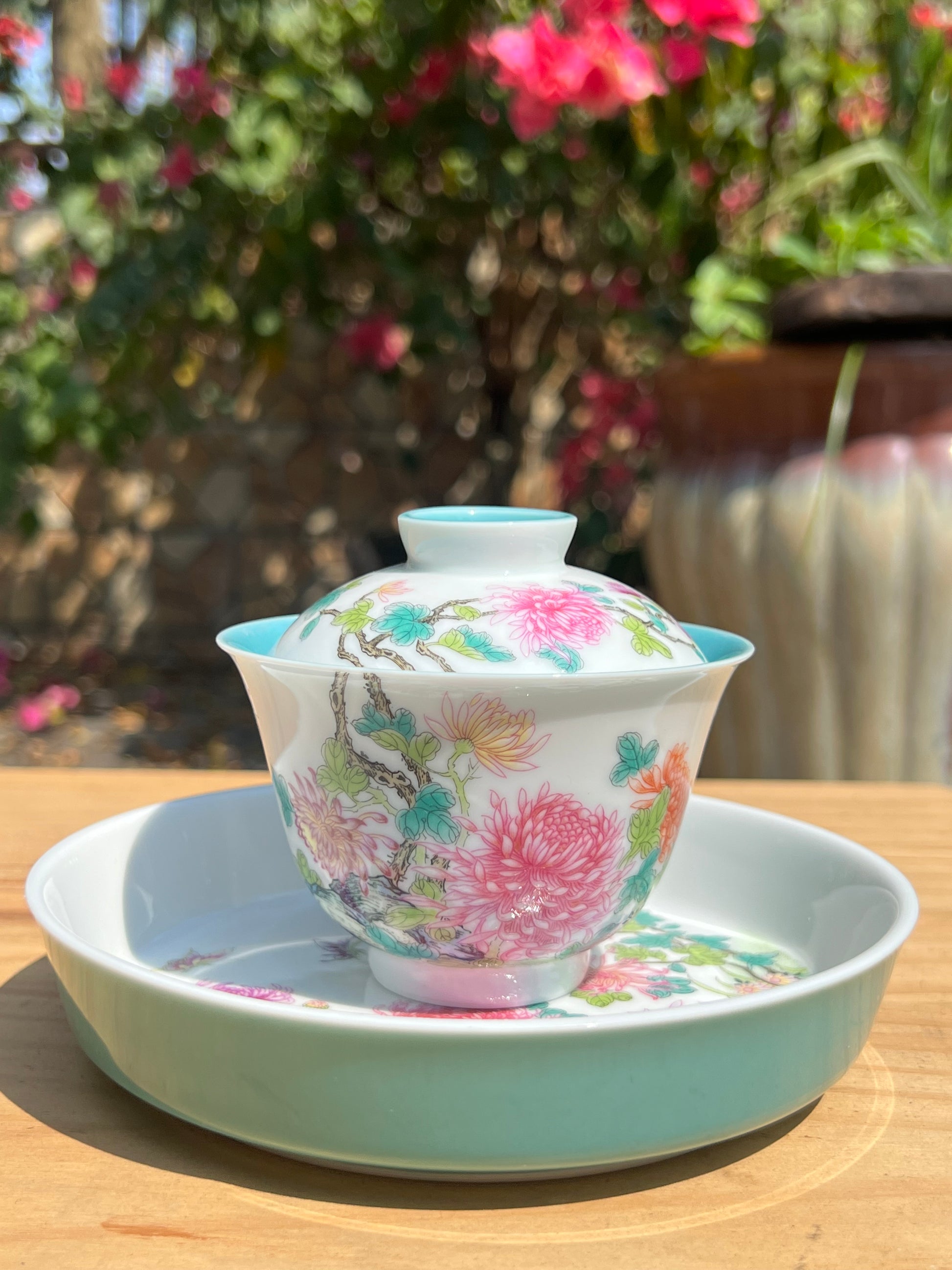 This is a Chinese Jingdezhen enamel chrysanthemum flower teapot gaiwan