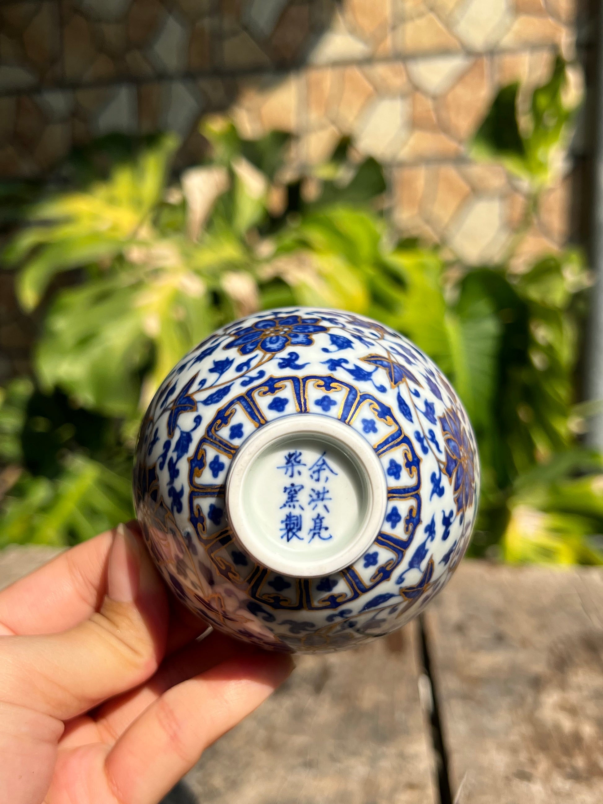 This is a Chinese Jingdezhen blue and white porcelain flower teapot gaiwan