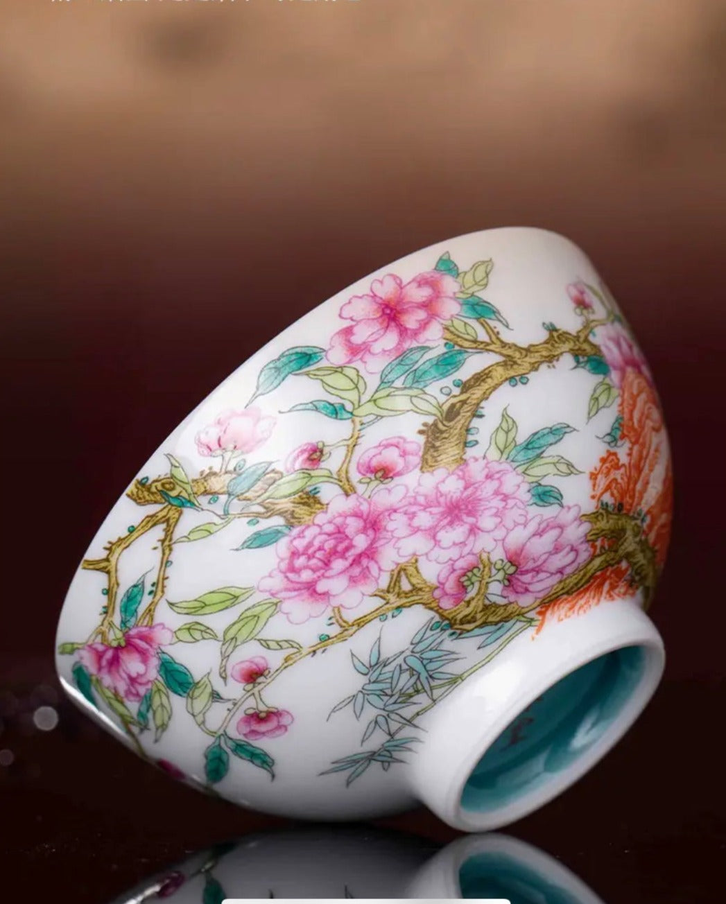 This is a Chinese Jingdezhen enamel flower teacup