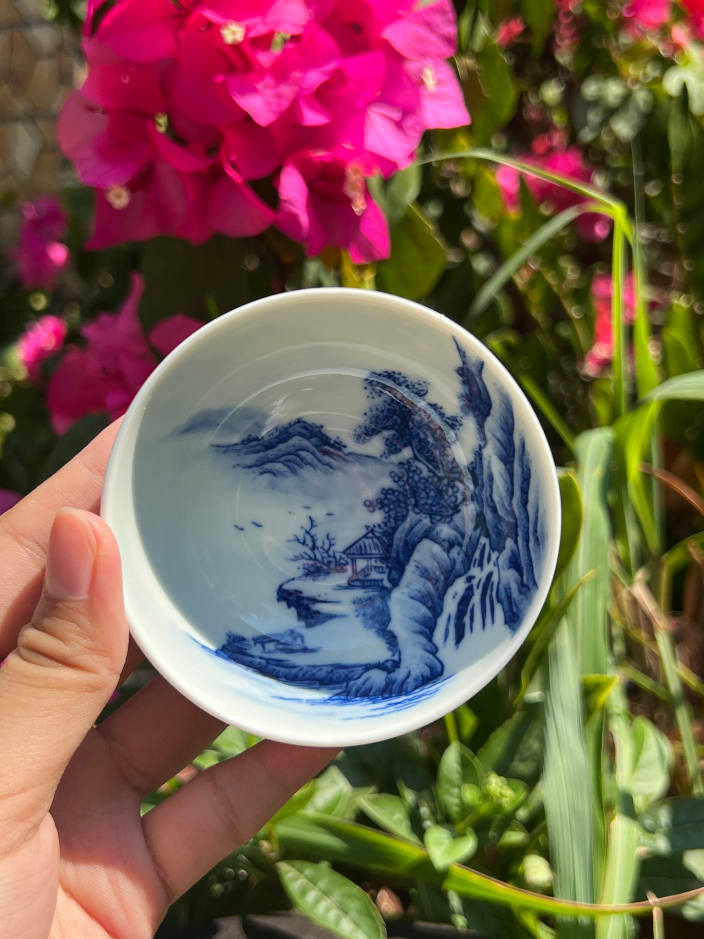 This is a Chinese Jingdezhen blue and white porcelain landscape teacup