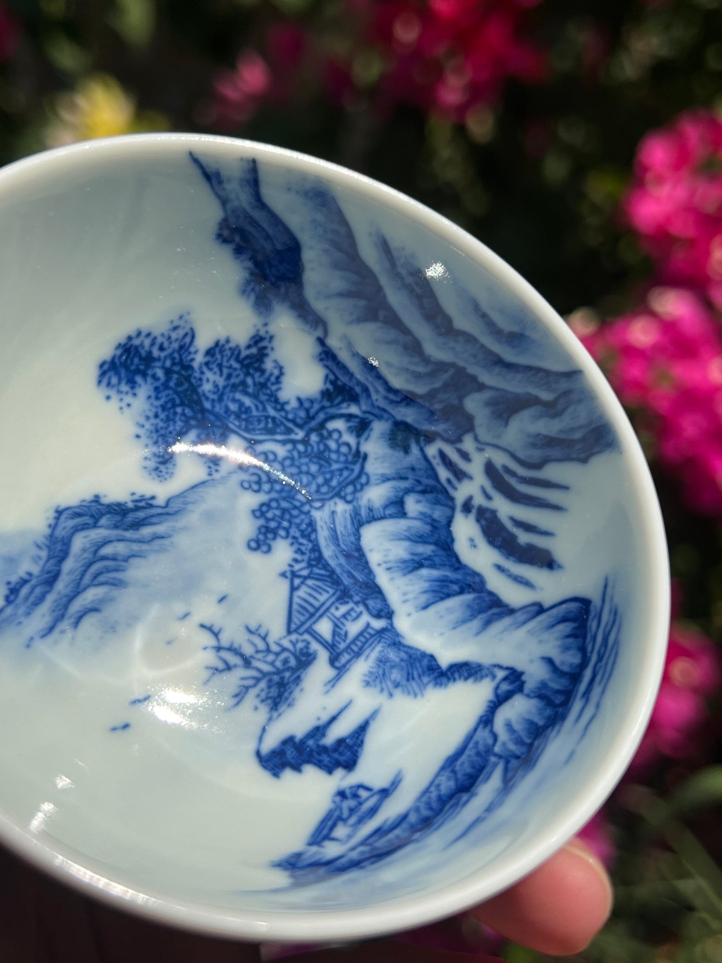 This is a Chinese Jingdezhen blue and white porcelain landscape teacup