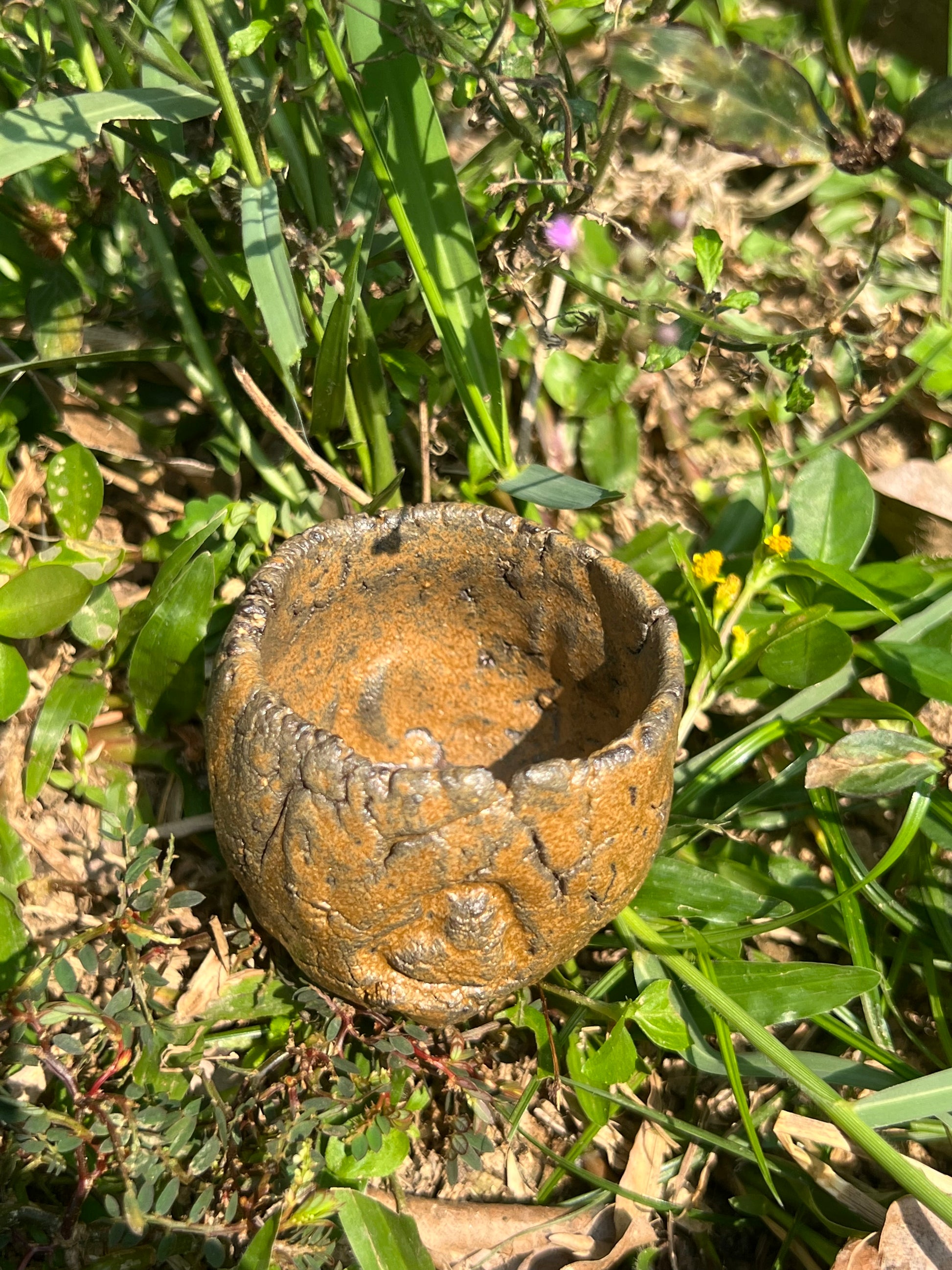 This is a pottery teacup