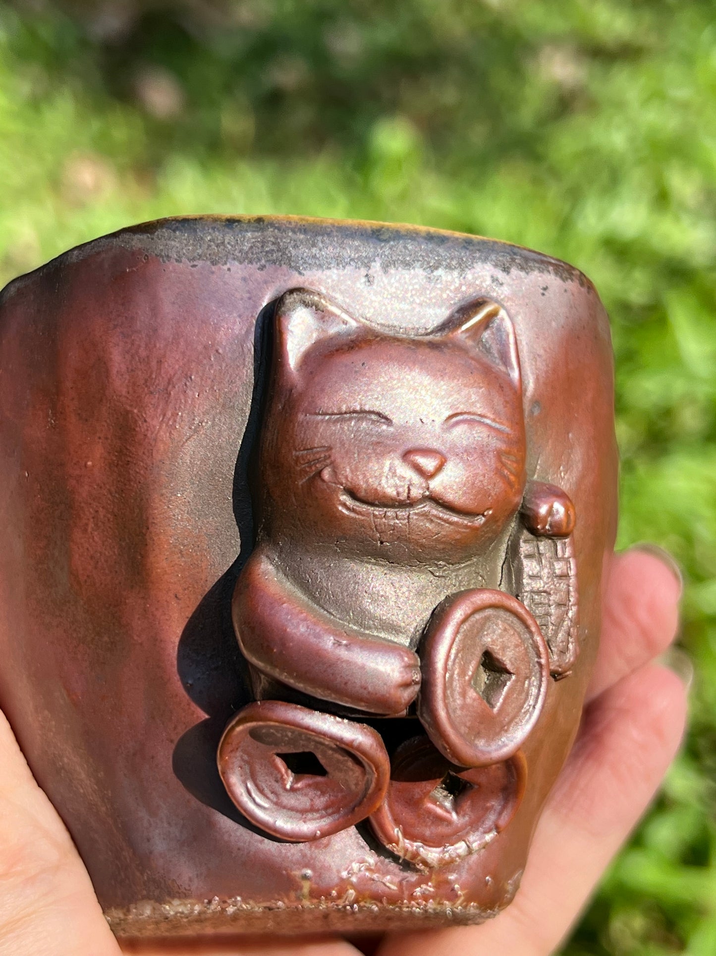 This is a woodfired tietai pottery teacup