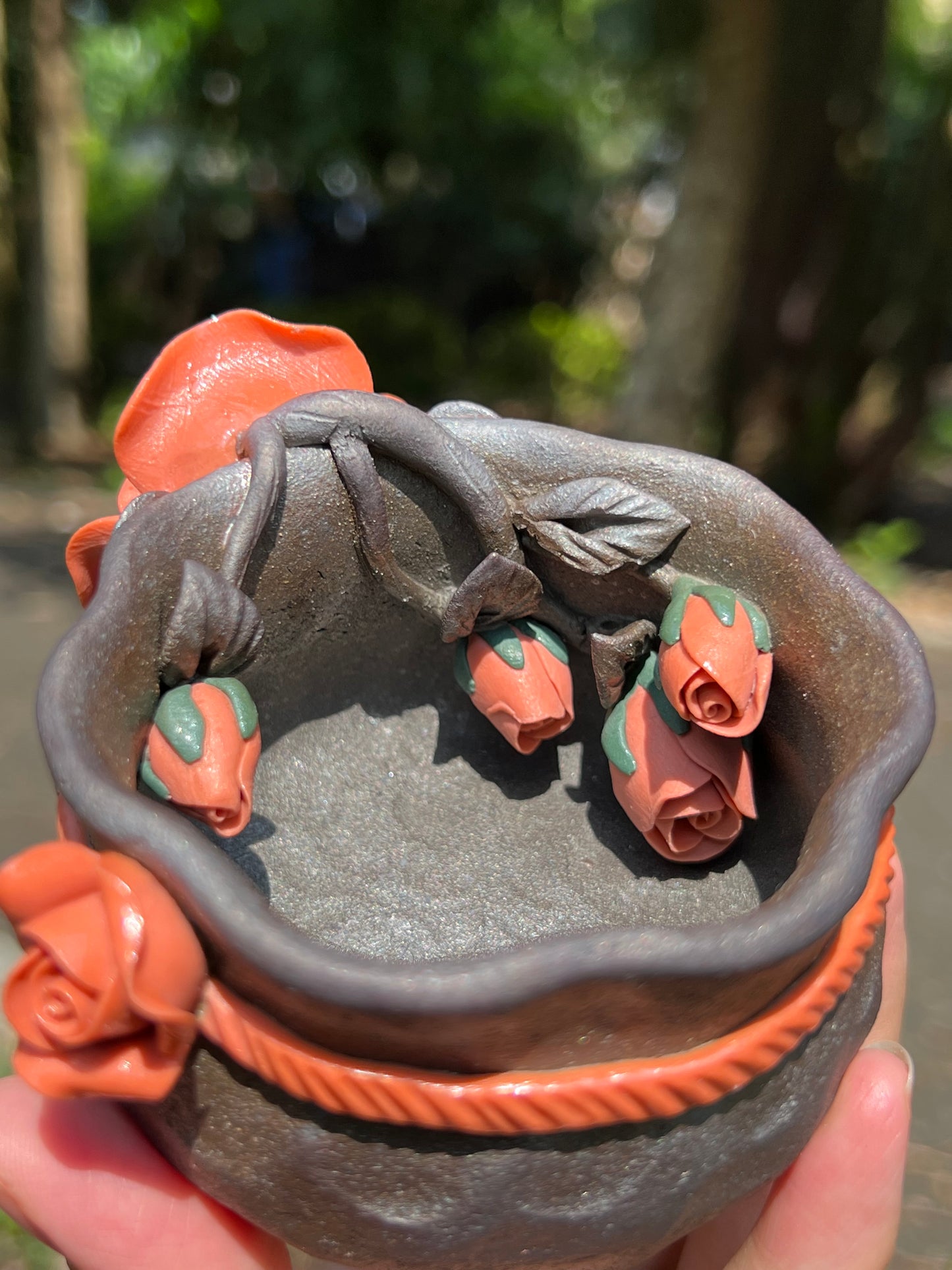 This is a woodfired tietai pottery flower teacup